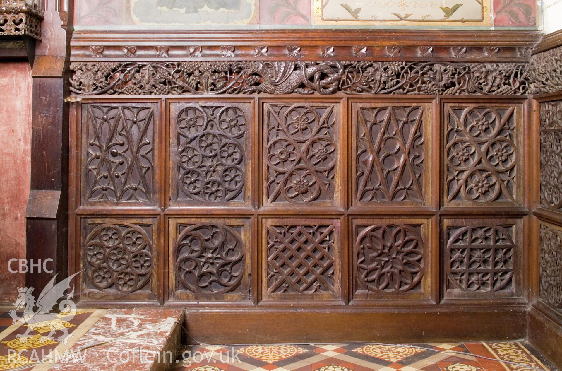 Re-used carved panels to right of altar.