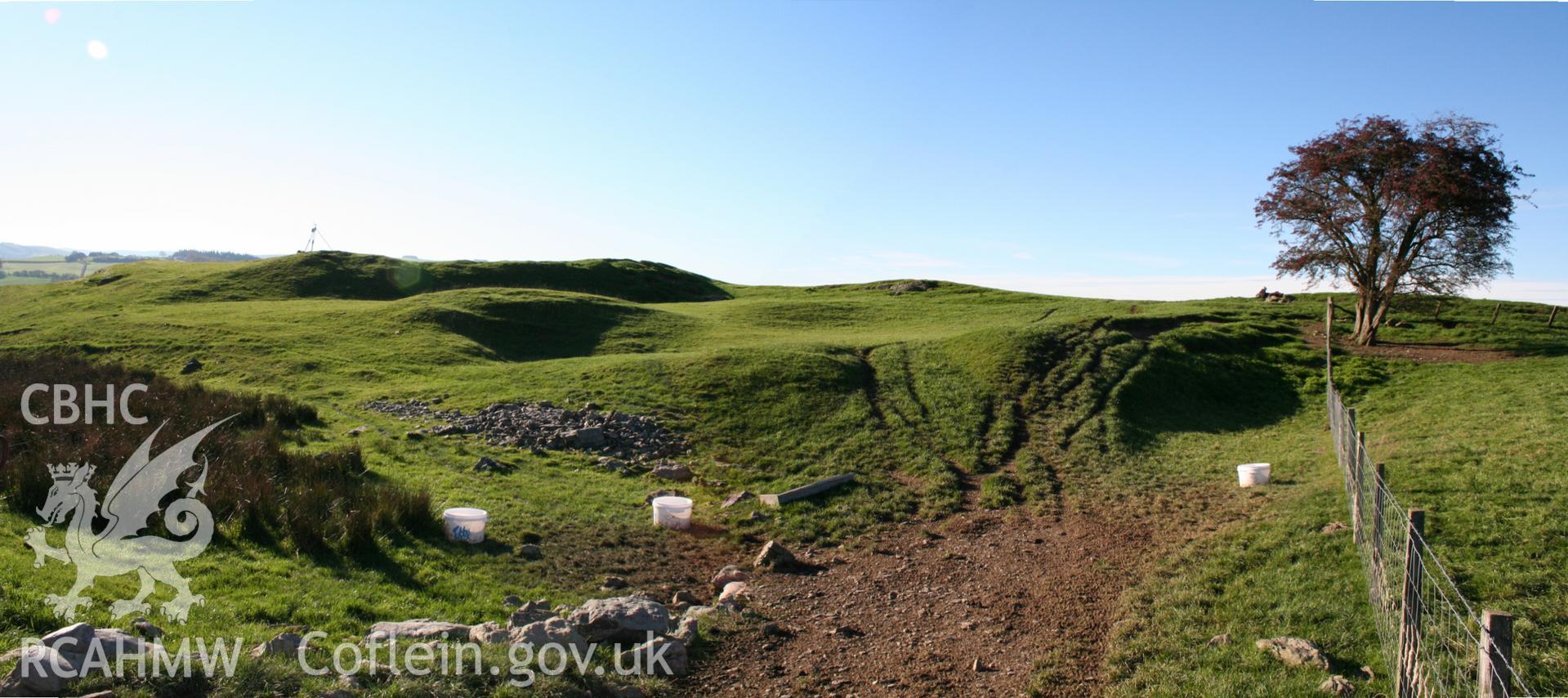 Pen'r-allt hillfort: panorama of entrance defences from the north-east, showing spring head