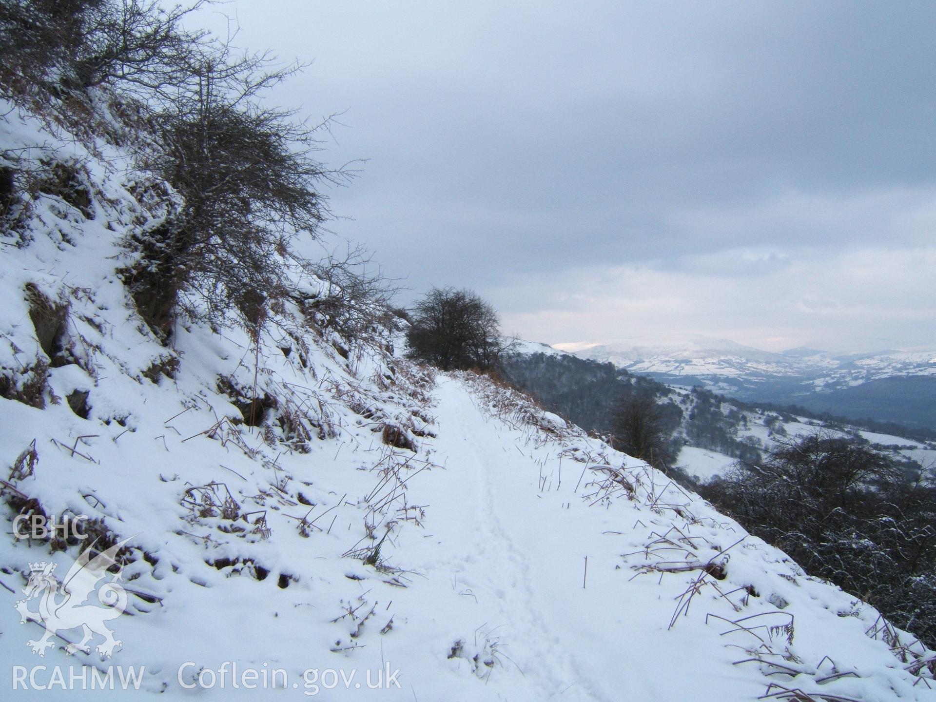 Tramroad mountain terrace NW from 50m NW of Llanwenarth Parish Road in snow.