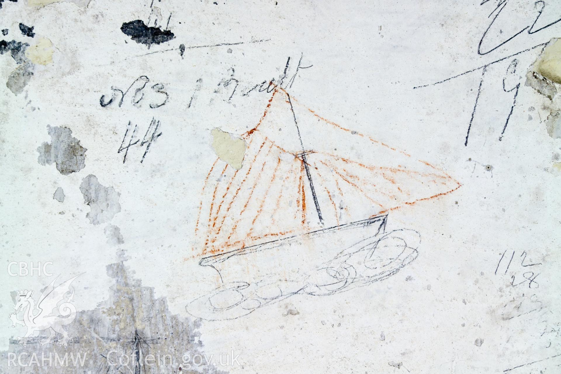 South wall, lefthand panel. Detail of graffitti.