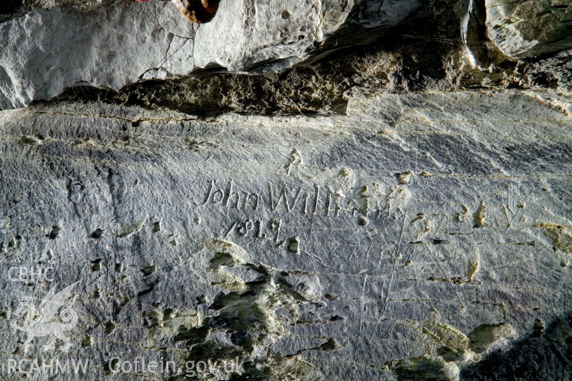 "John Williams 1819" inscription on stone on east side.