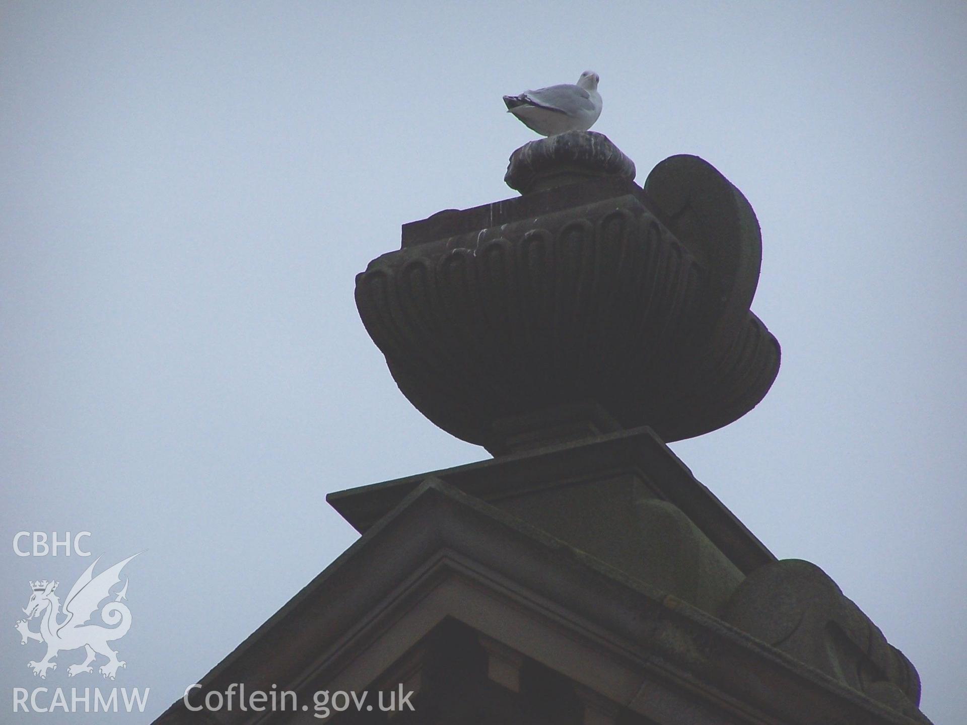 Chapel: Exterior - detail of urn on gable peak.