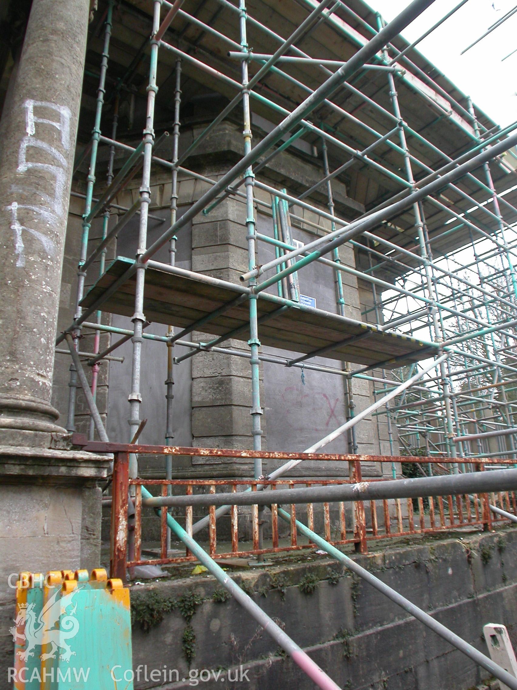 Splayed bay window to the right of the main entrance.