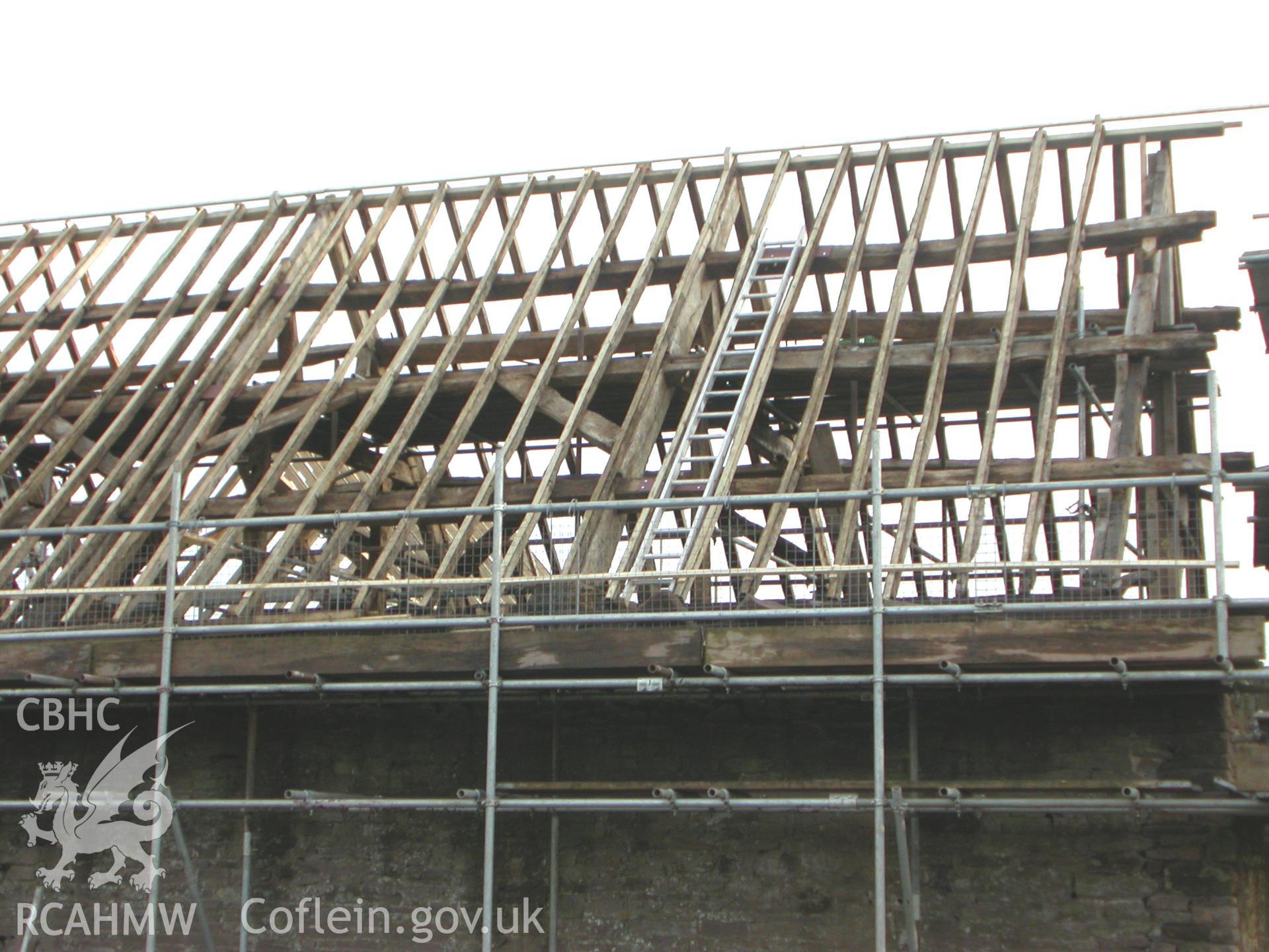 Barn interior, axle drive mounting opening and frame in north elevation.