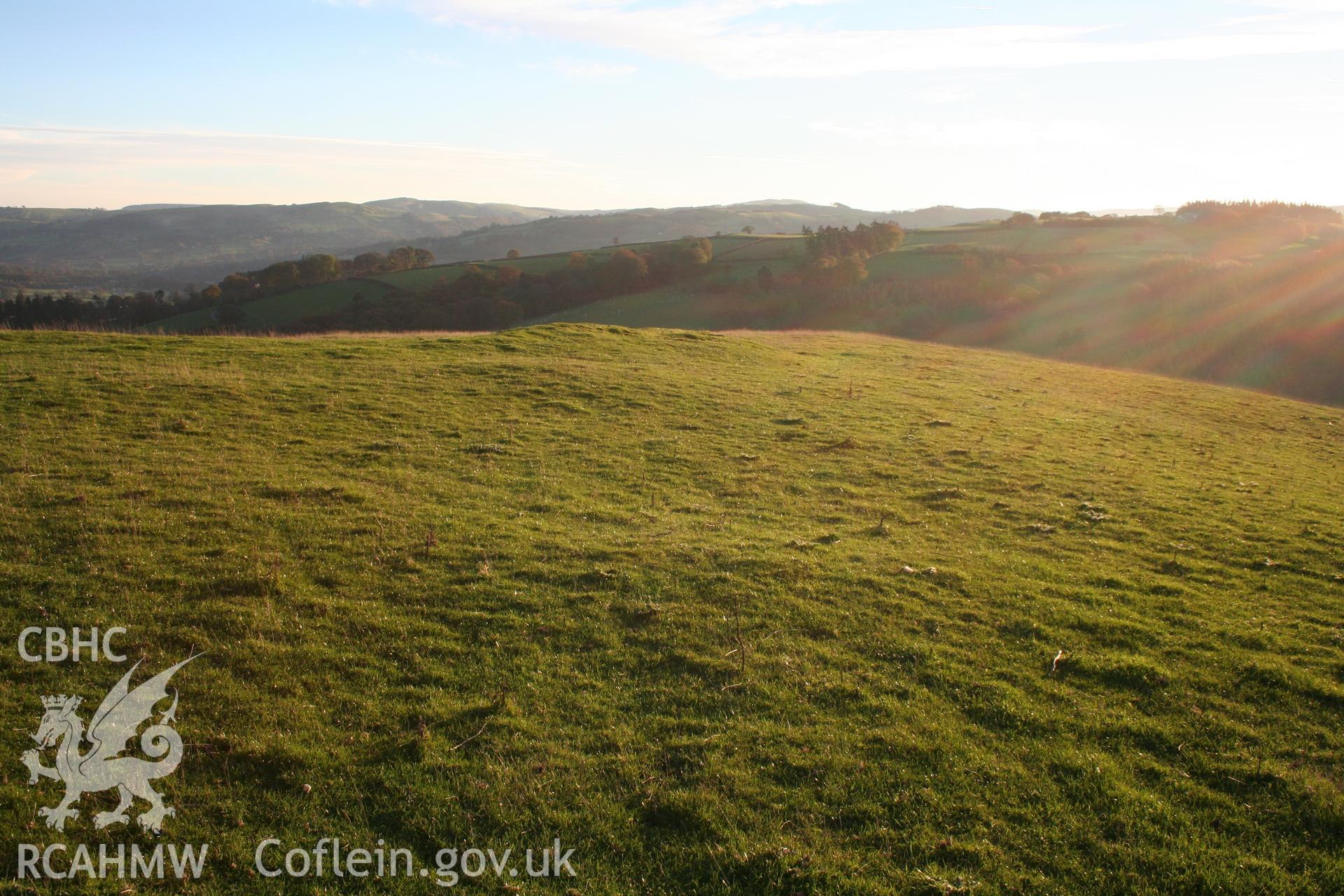 Pen'r-allt hillfort: view of slight hut platforms in interior, from the north