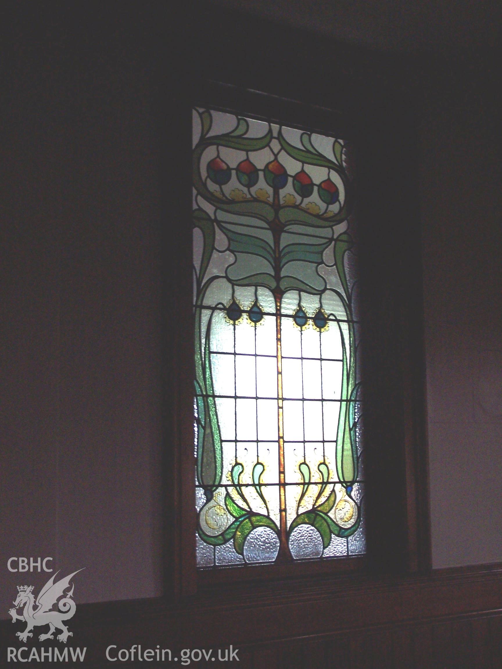 Chapel: Interior - stained glass window between lobby and main chapel.