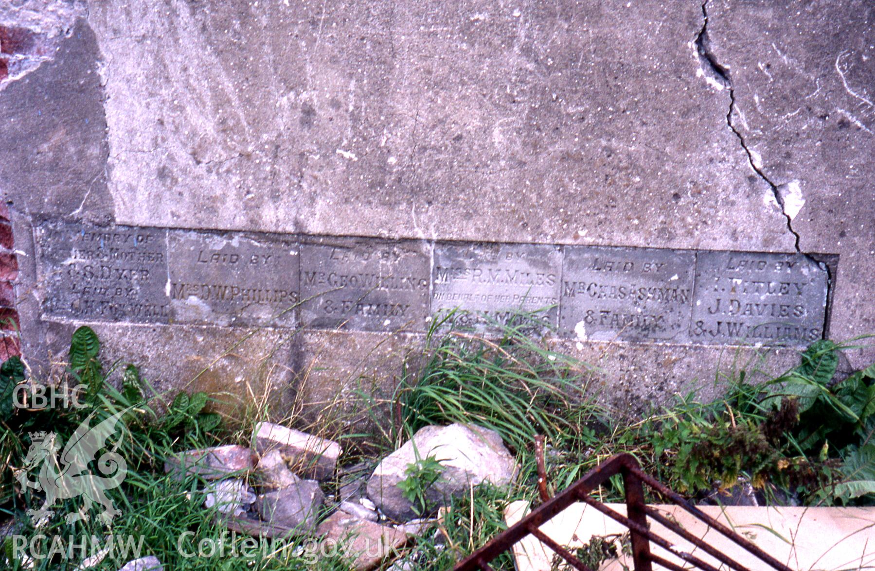 Exterior, foundation stones (1912?) on south side of SW. gable-end elevation.