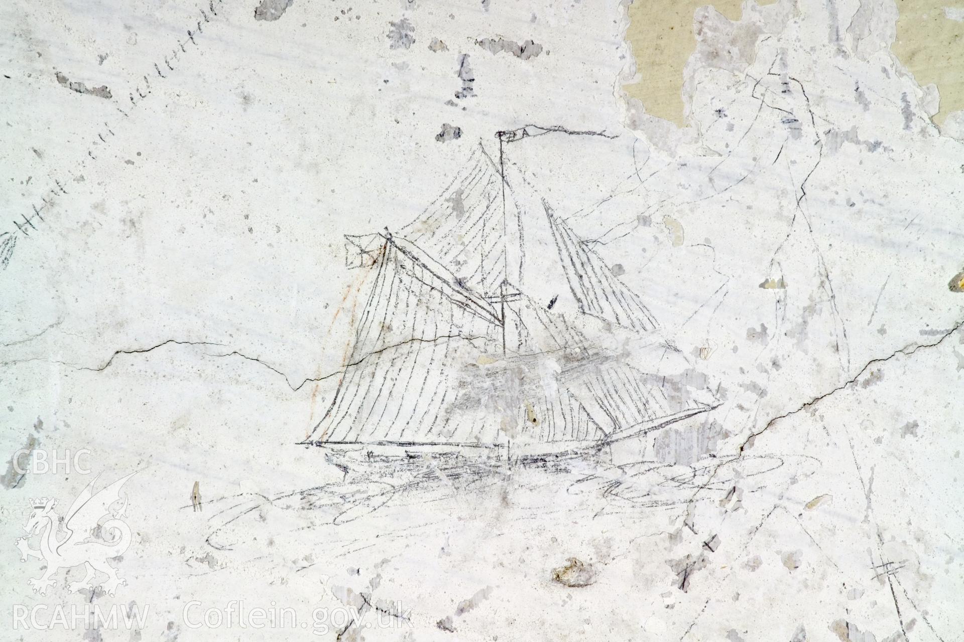 South wall, lefthand panel. Detail of graffitti.