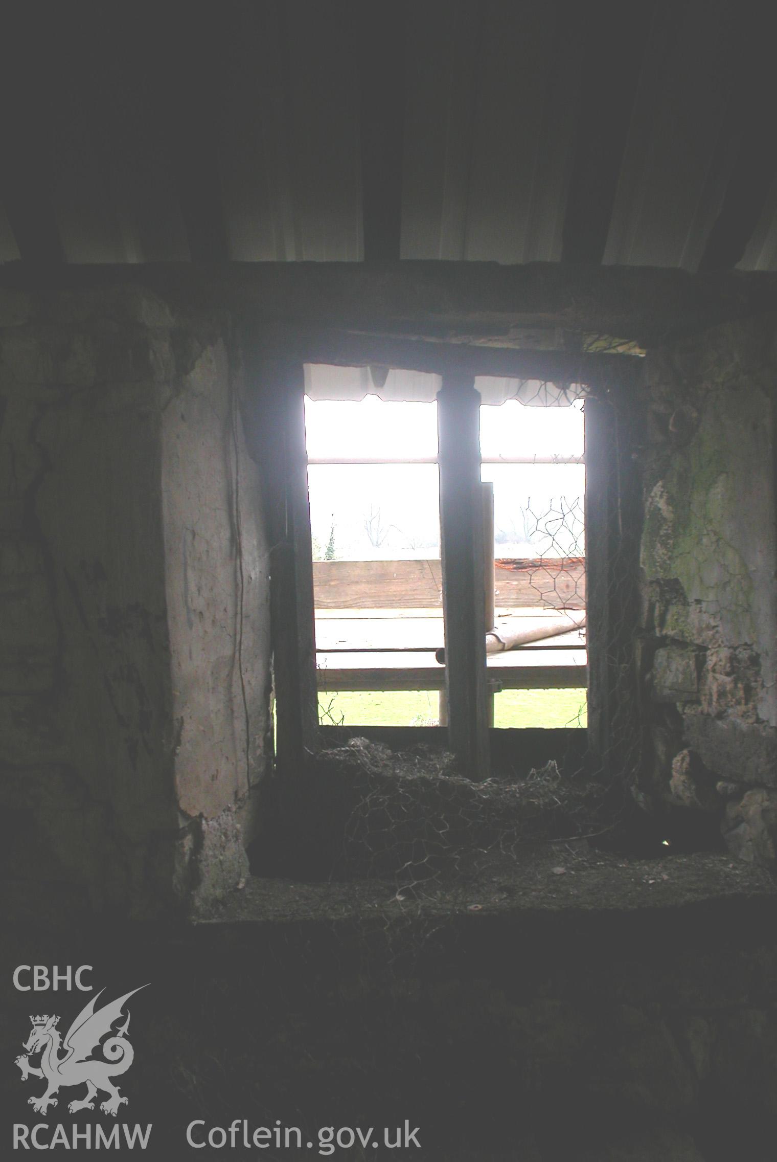 First-floor window to S-W wall.
