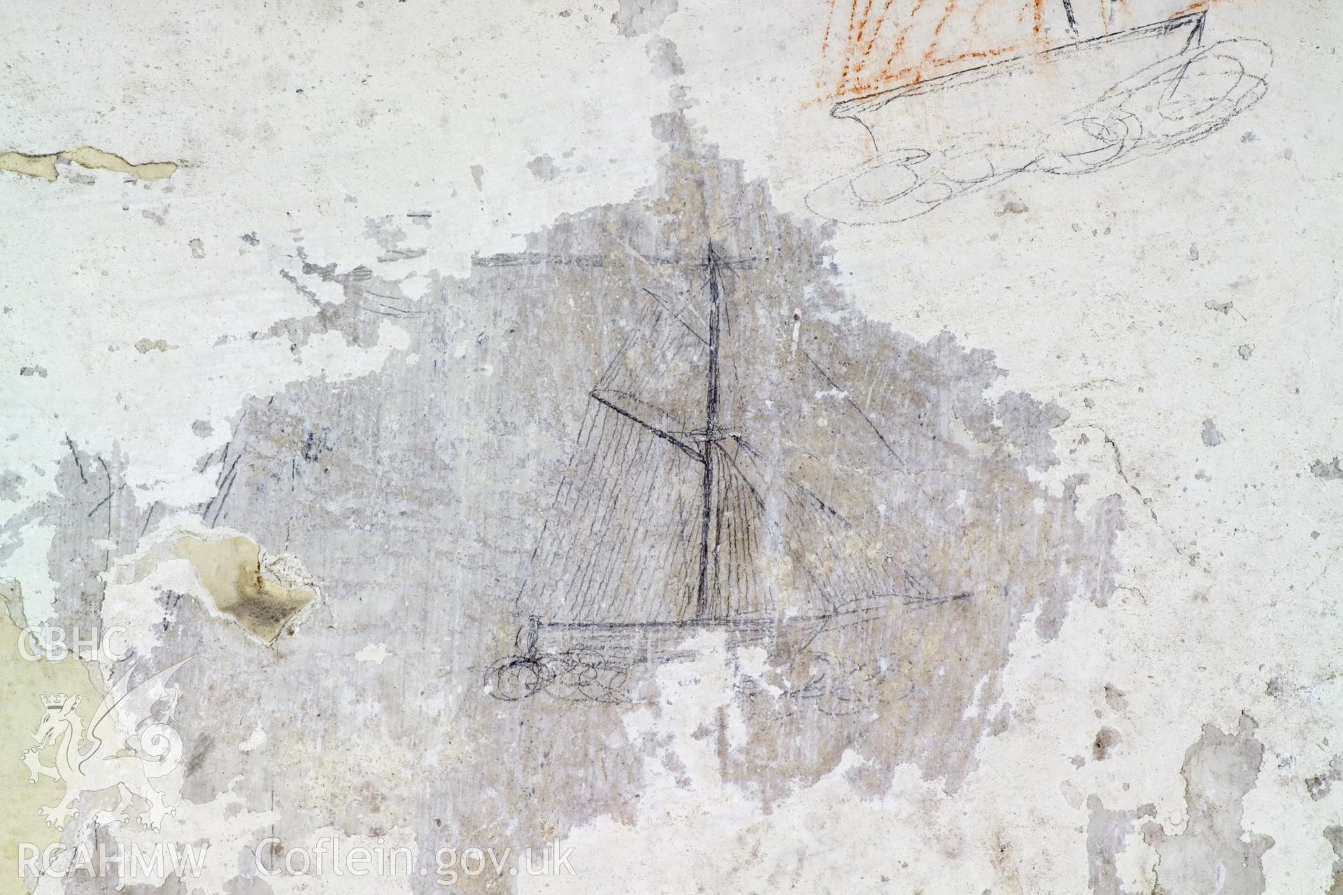 South wall, lefthand panel. Detail of graffitti.