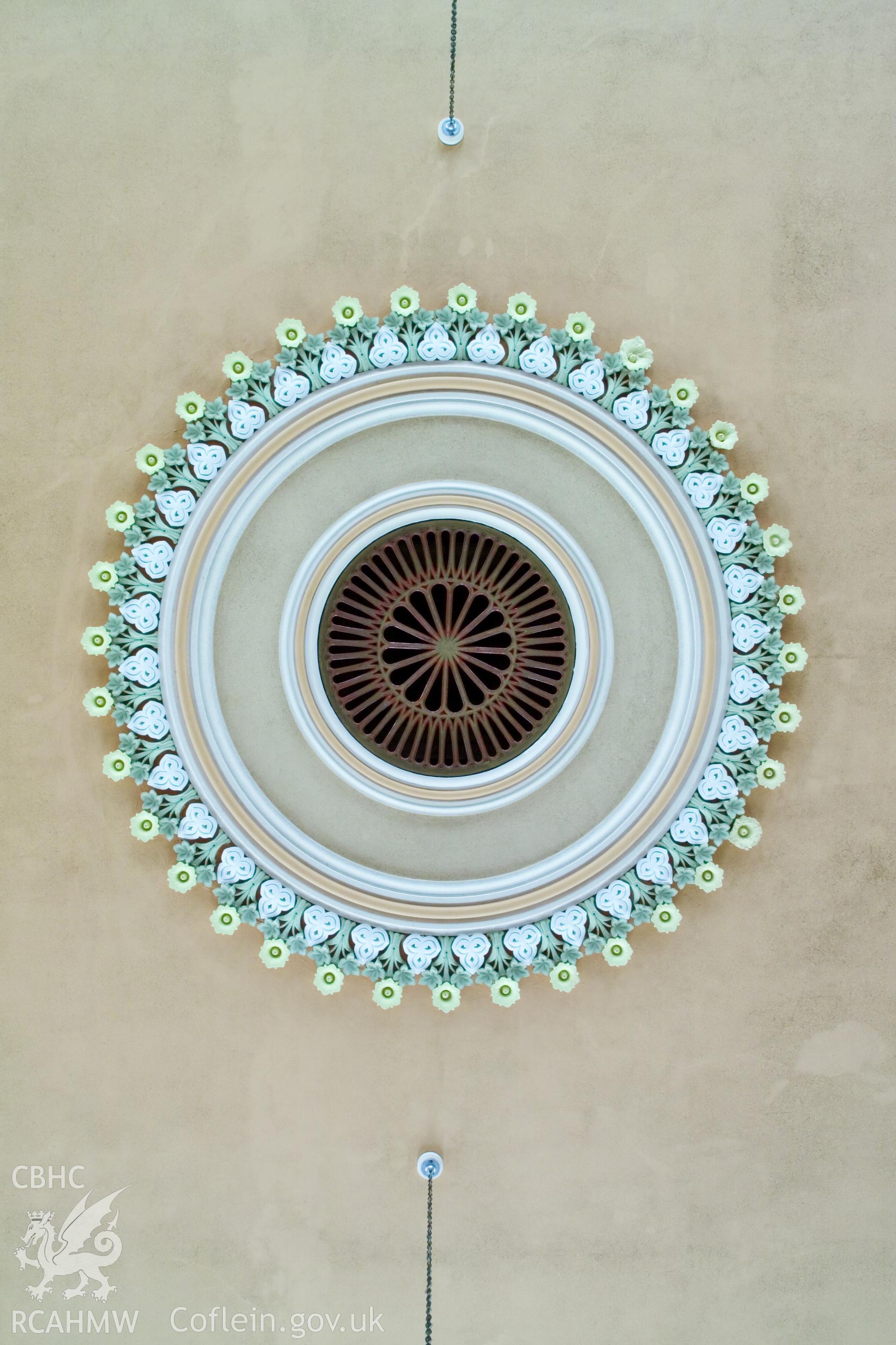 Detail of plasterwork on ceiling vent.