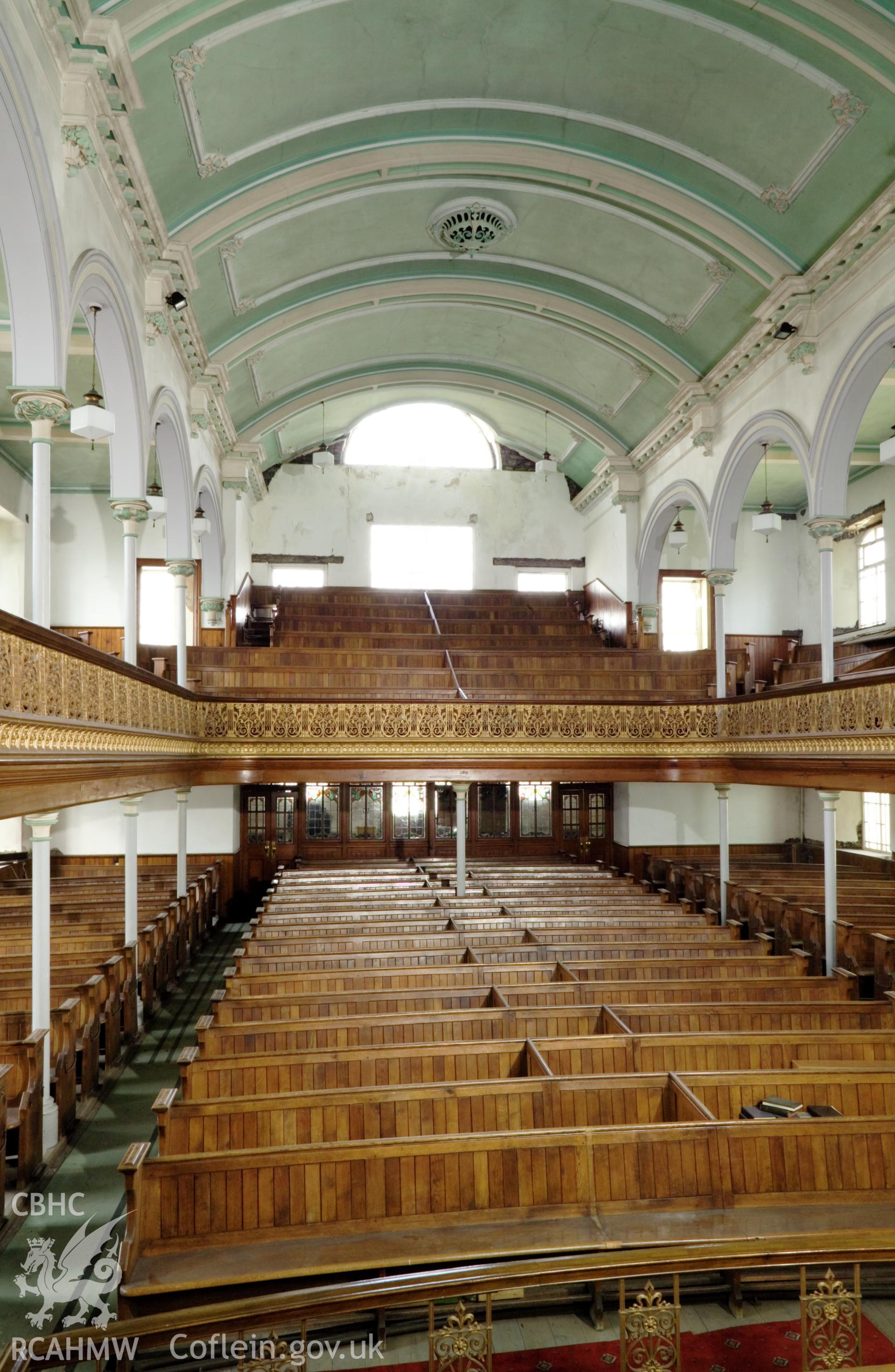Off-centre view of interior looking northeast from organ. Vertical.