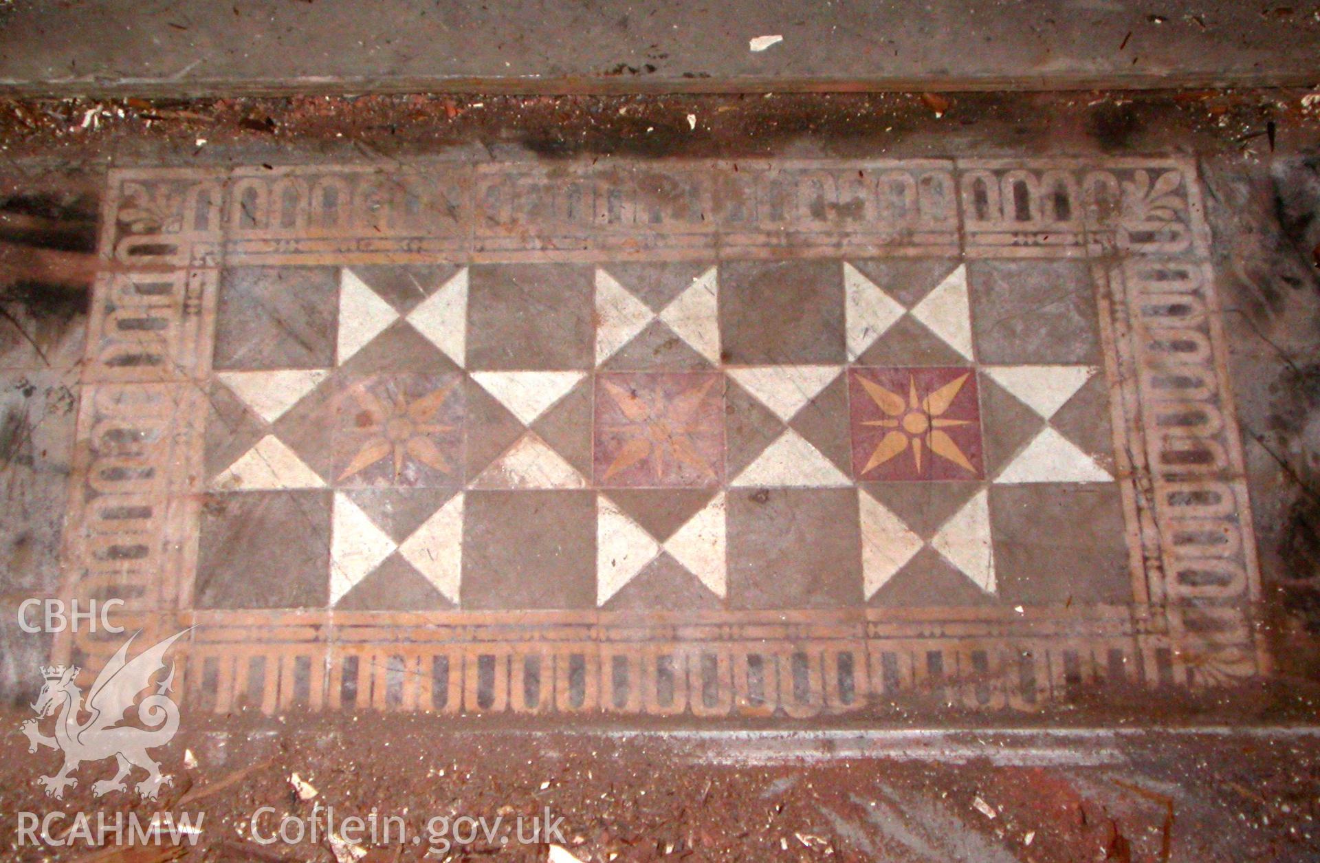 Ground floor, example of tiled threshold between internal rooms.