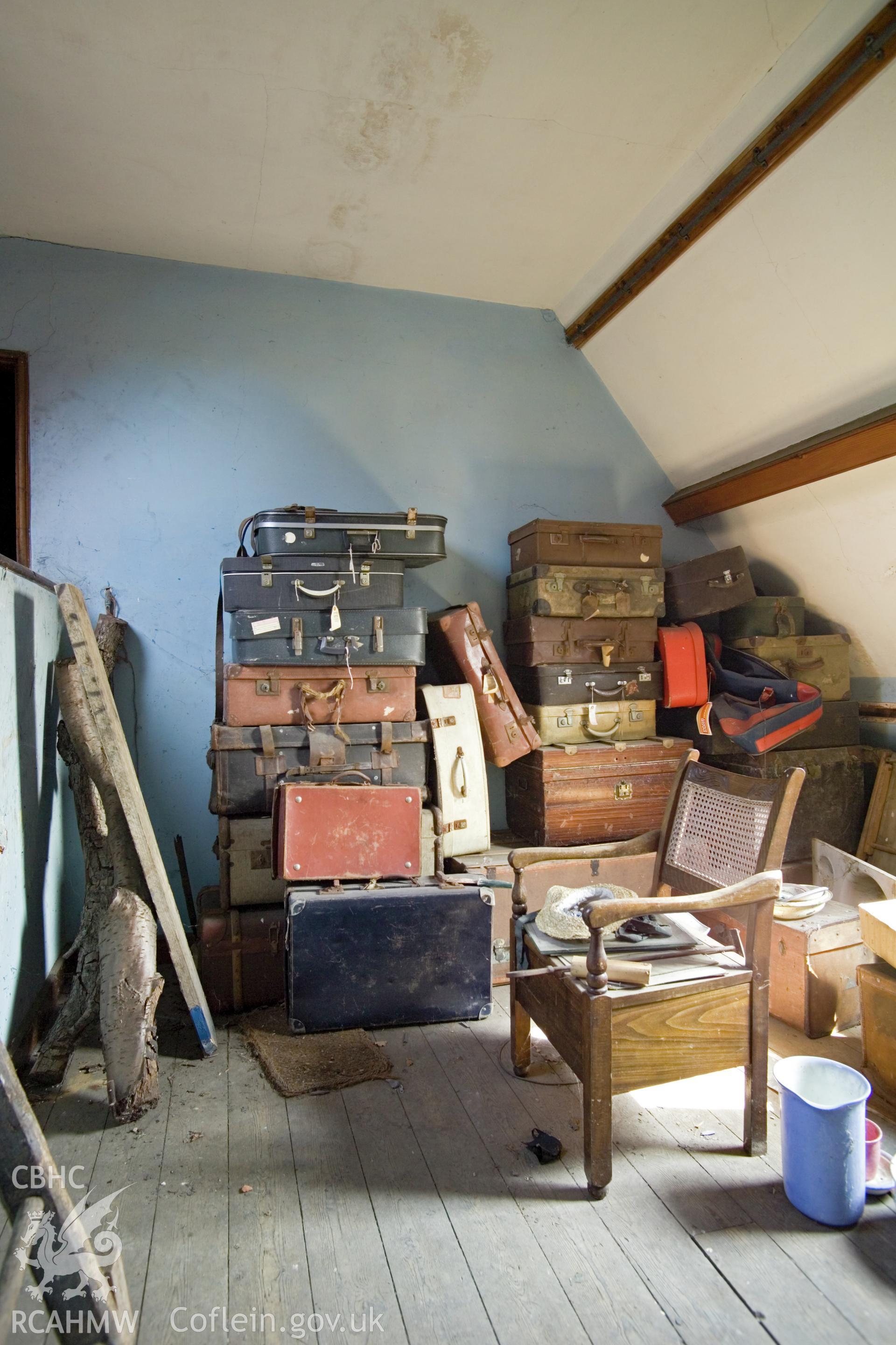 Attic storeroom for suitcases.