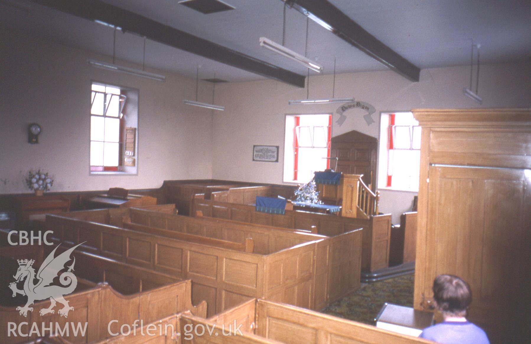 Interior, box pews looking to pulpit.