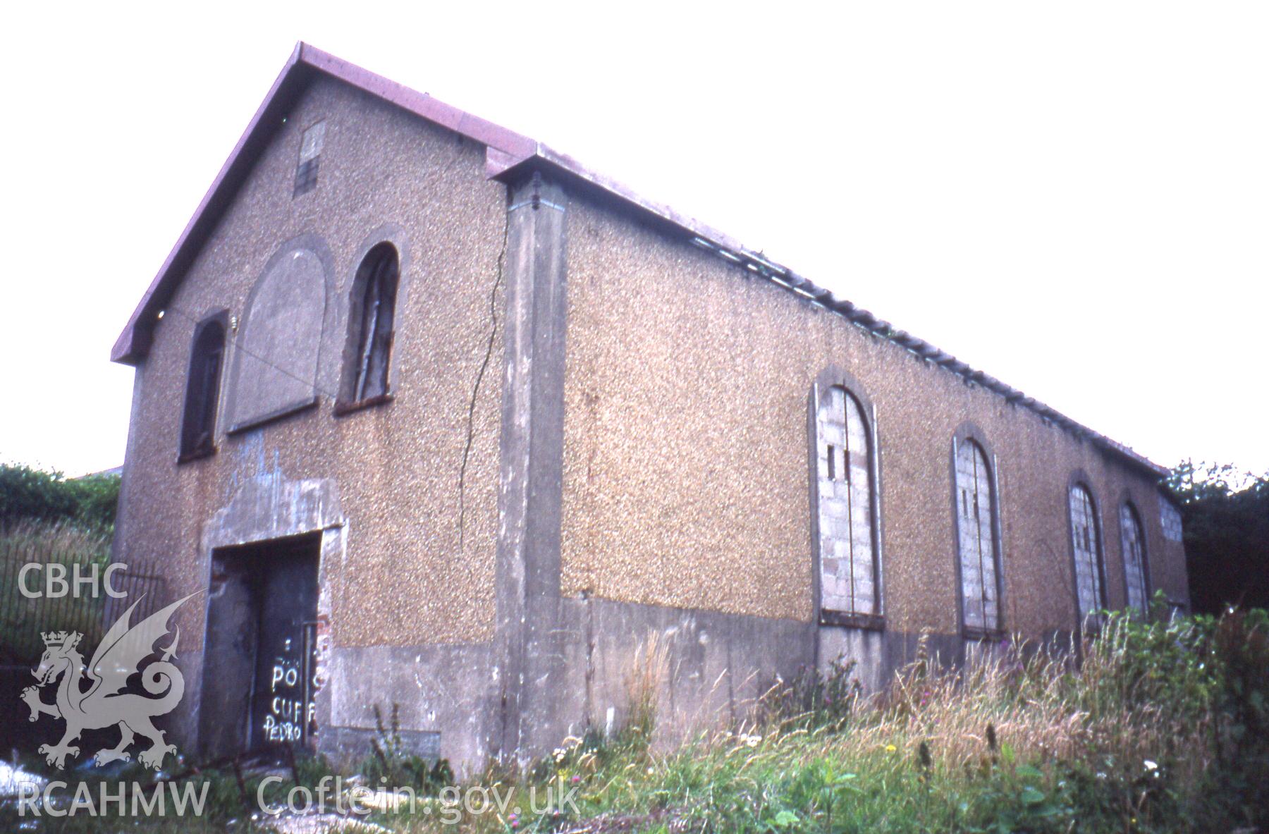 Exterior, 3/4 view, SW. main gable-end elevation & SE. side.