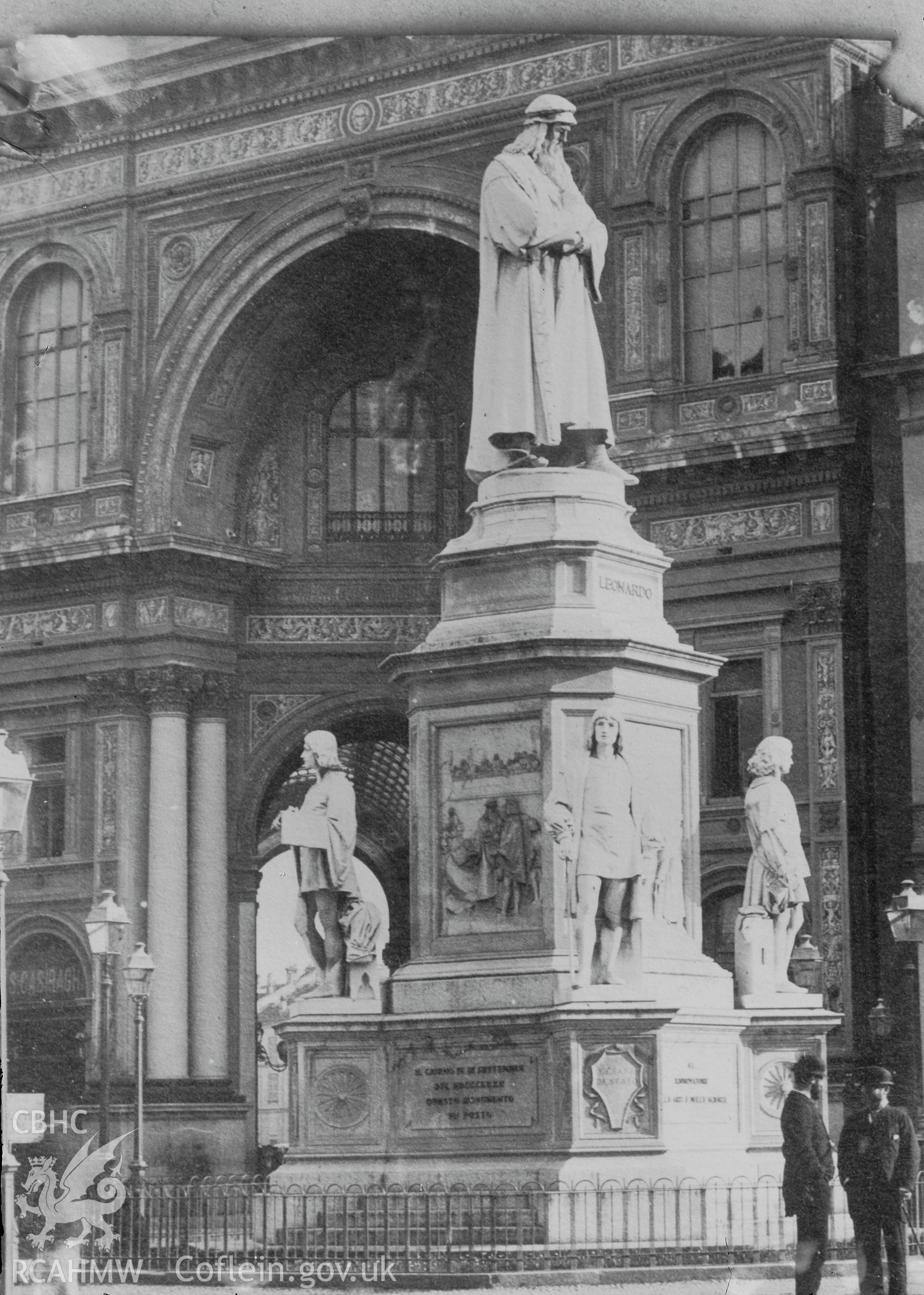 Black and white image dating from c.1910 showing Statua di Leonardo da Vinci at Piazza della Scala, Milan, taken by Emile T. Evans.