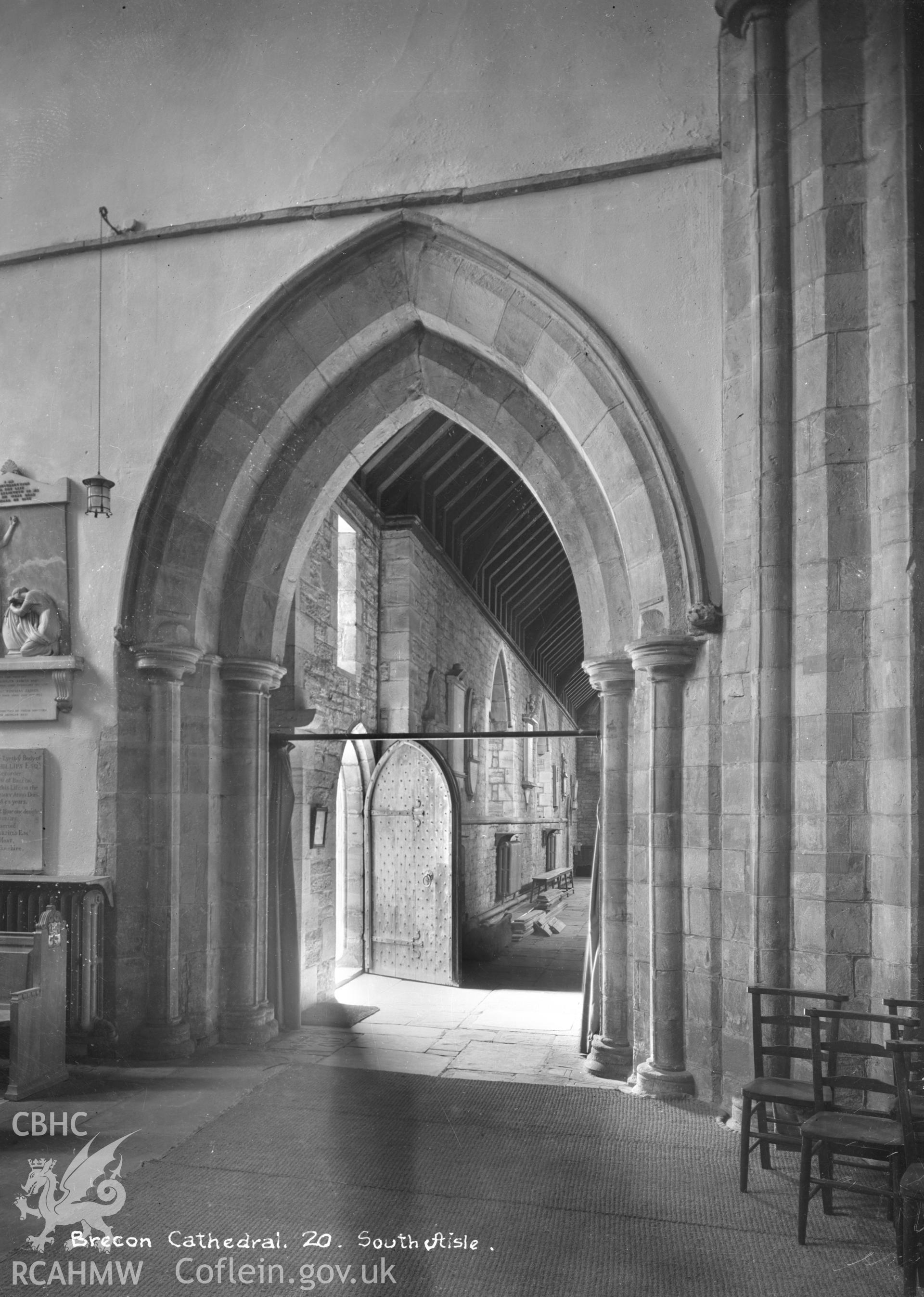 Interior view of Brecon Cathedral showing the south aisle, taken by W A Call circa 1920.