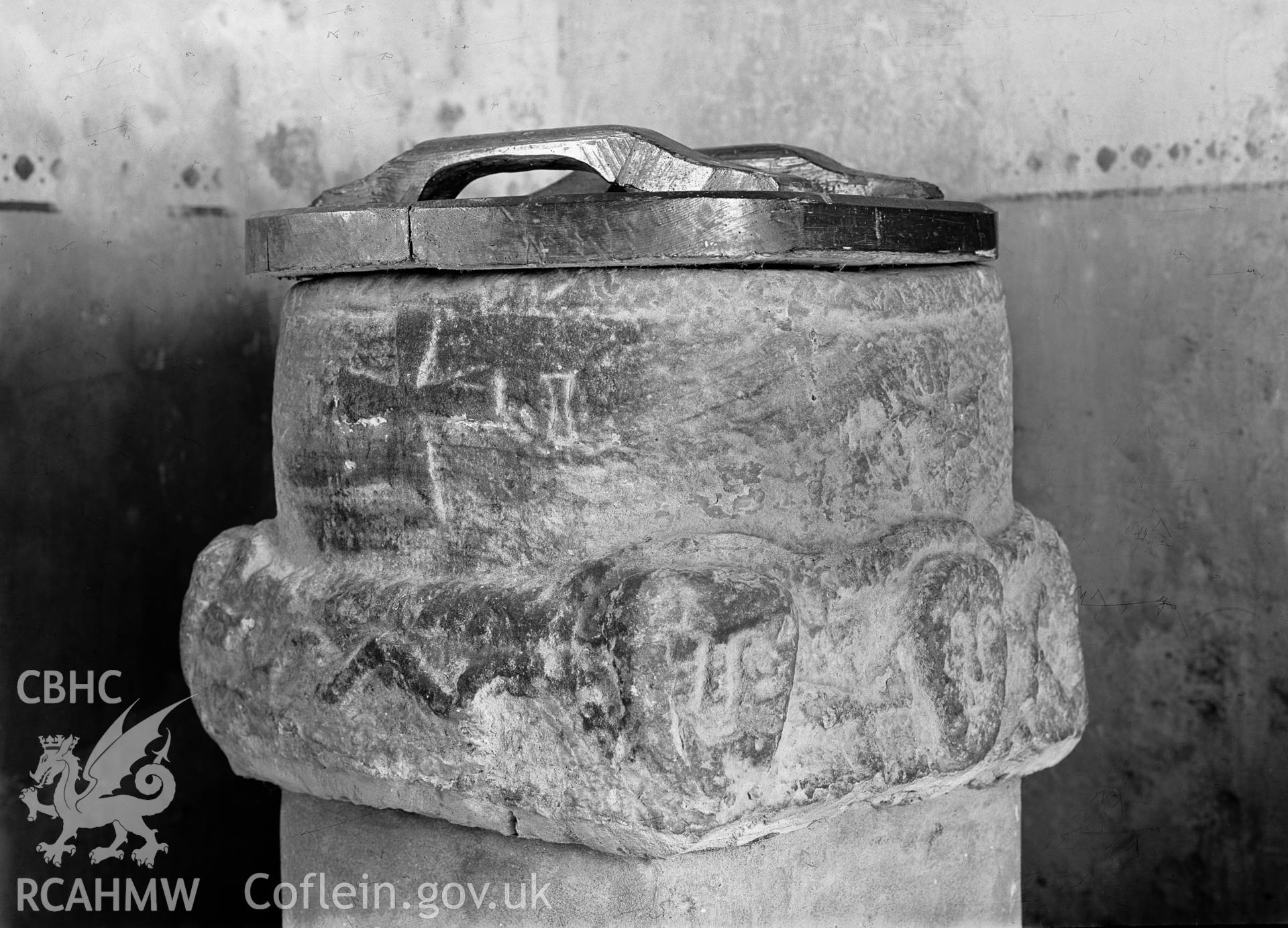 Black and white photograph of the font at St Mary's Church, Dwyran.