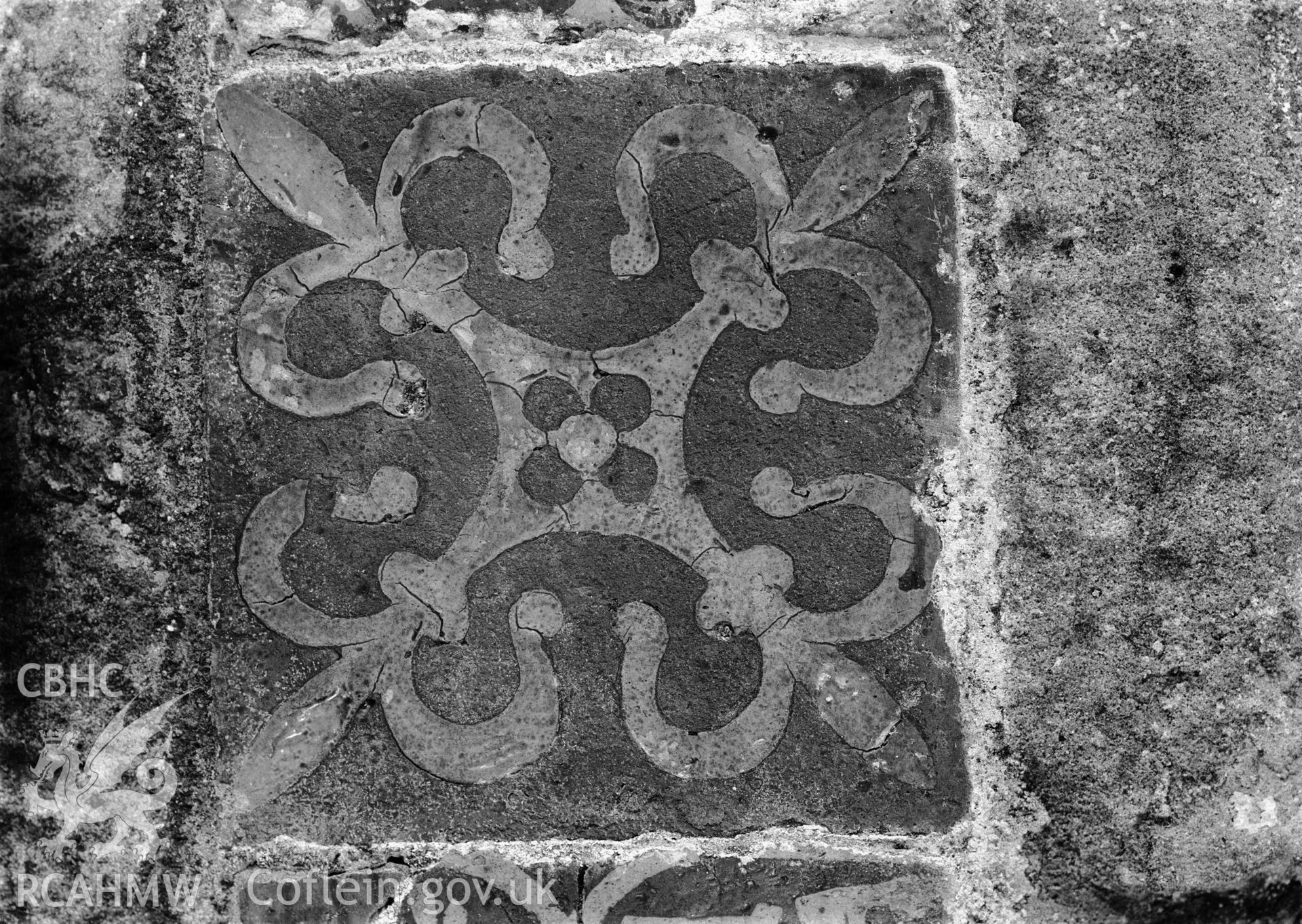 View of a patterned floor tile from Monmouth Church, taken by Clayton.
