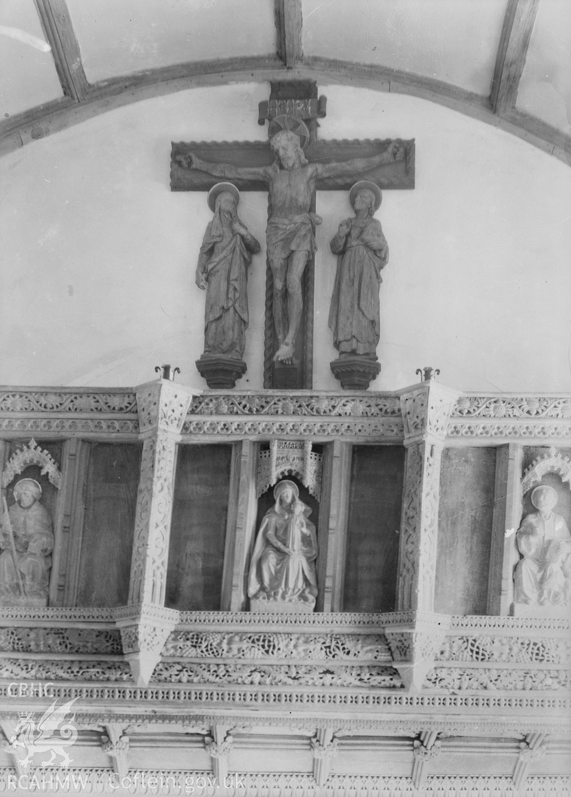 View of the rood screen in Llanfilo Church, taken by W A Call circa 1920.