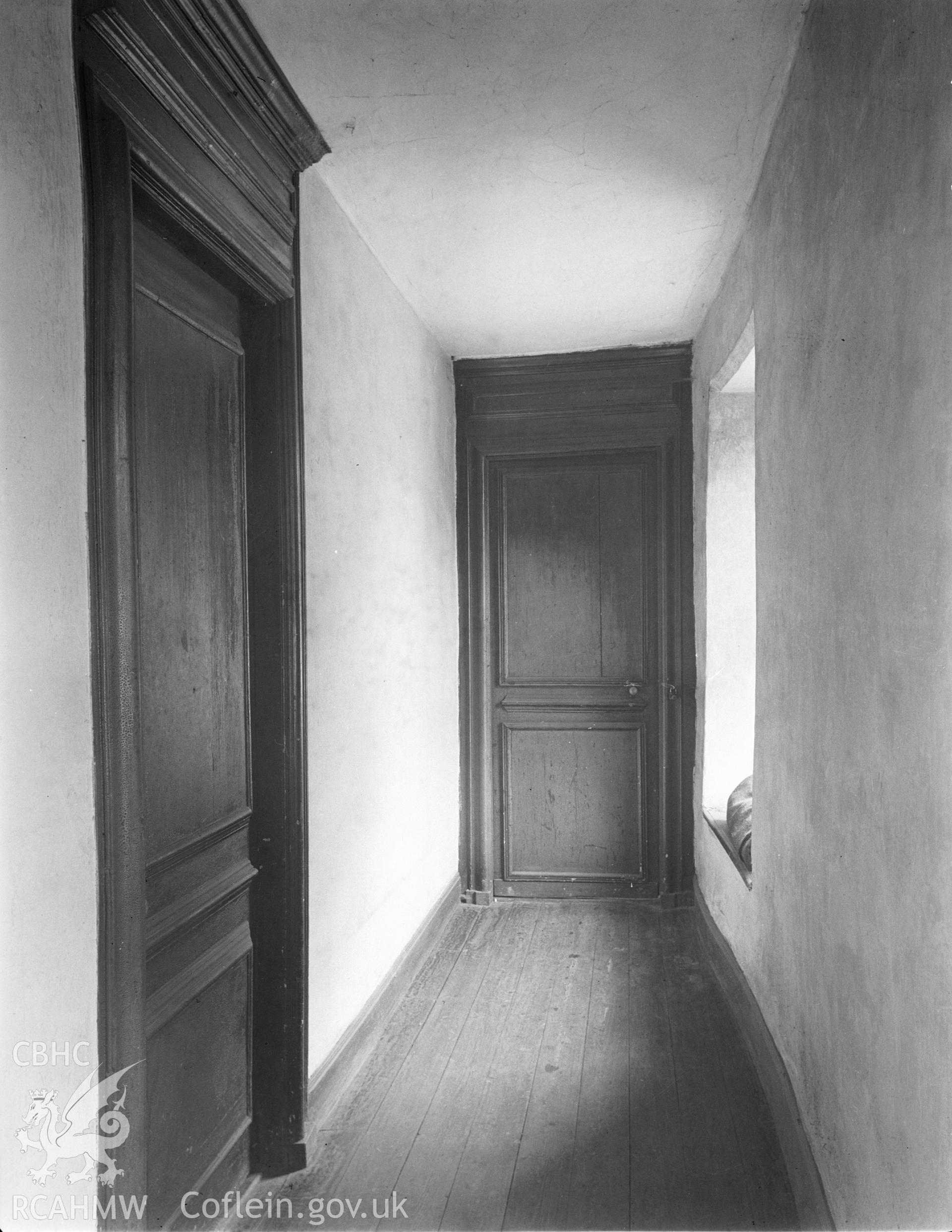 Interior view showing corridor and doors.
