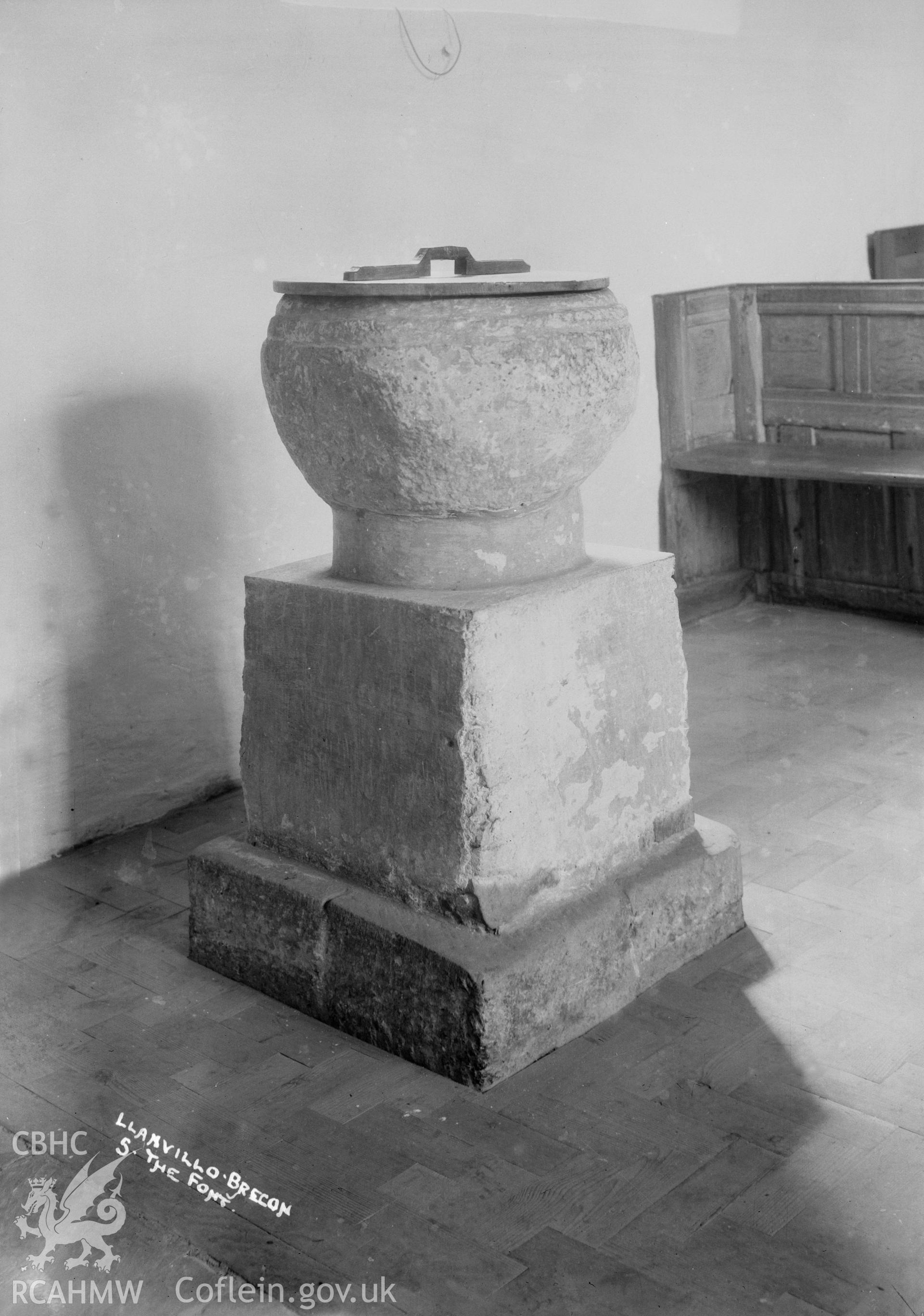 Interior view of Llanfilo Church showing font,  taken by W A Call 1931.