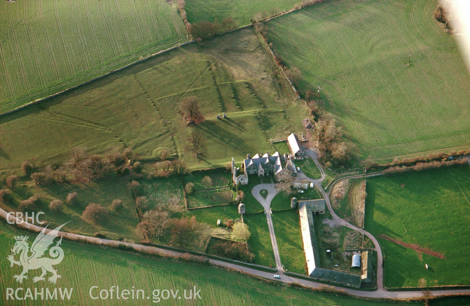 Slide of RCAHMW colour oblique aerial photograph of Old Gwernyfed House, taken by C.R. Musson, 1993.