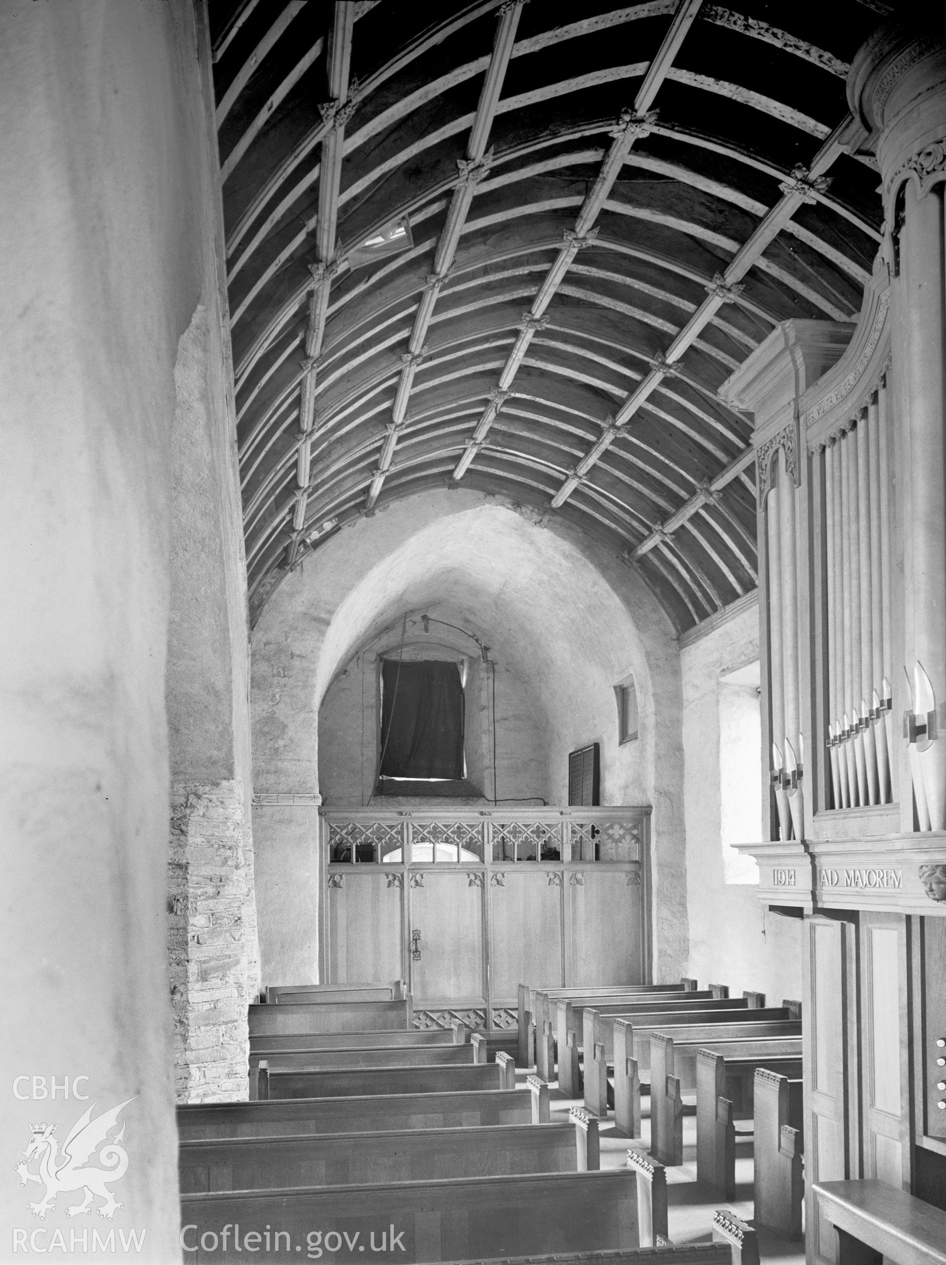 Interior view of St Illtyd's Church showing the roof and the east arch of the tower