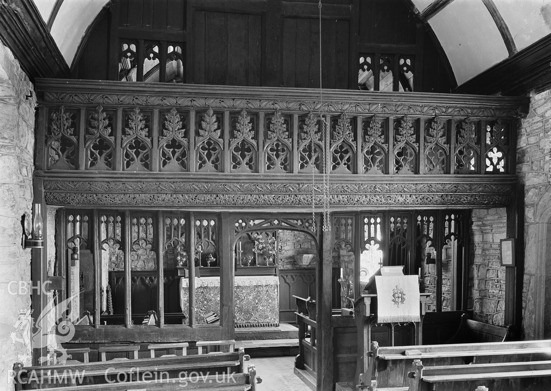 Interior view of Bettws Newydd Church showing rood screen.