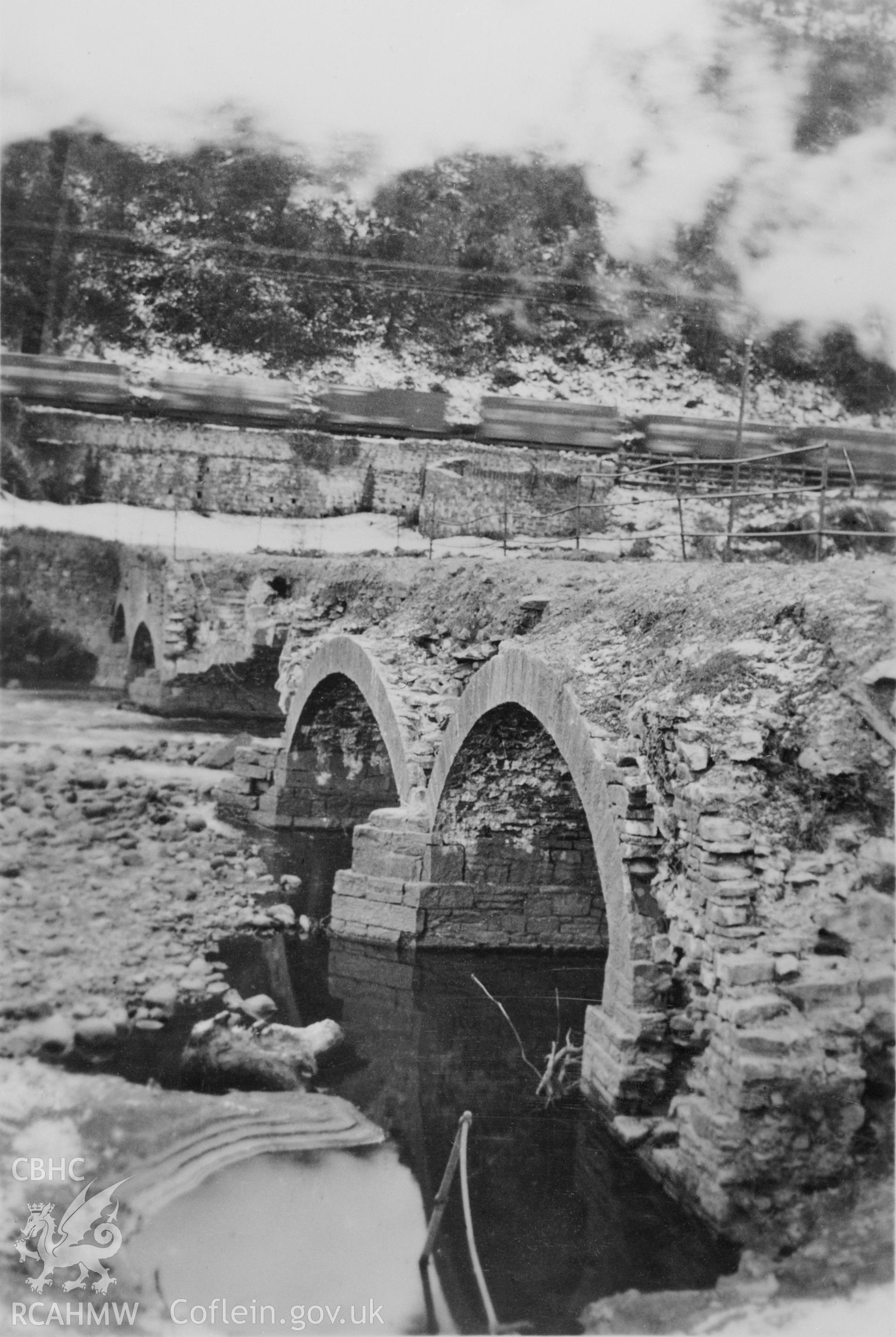 View of the tramroad embankment at Ynys Geinon Colliery, copy of a photograph held in Swansea City Archive.