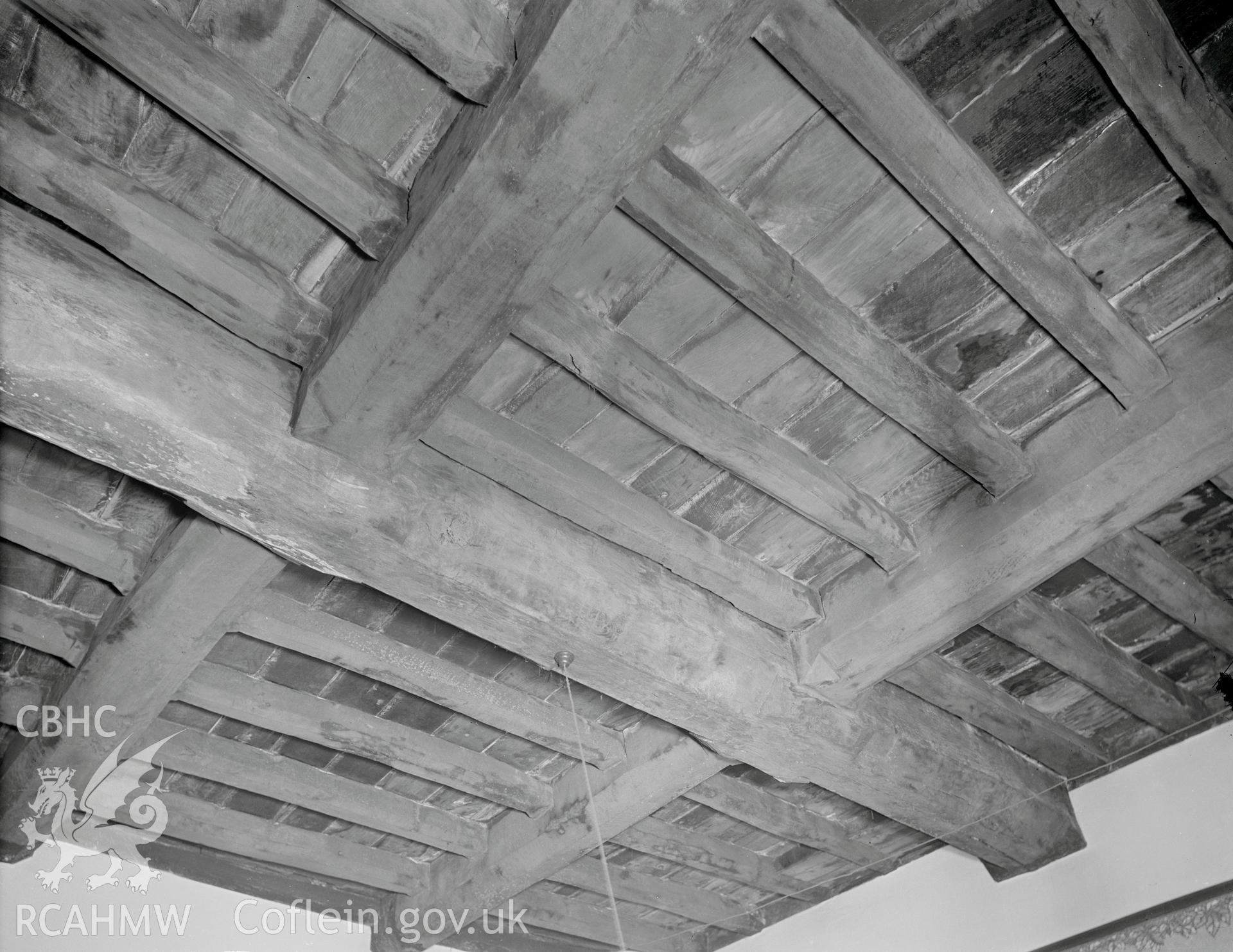 Interior view of Fferm, showing roof beams in the kitchen, taken 11.04.1942.