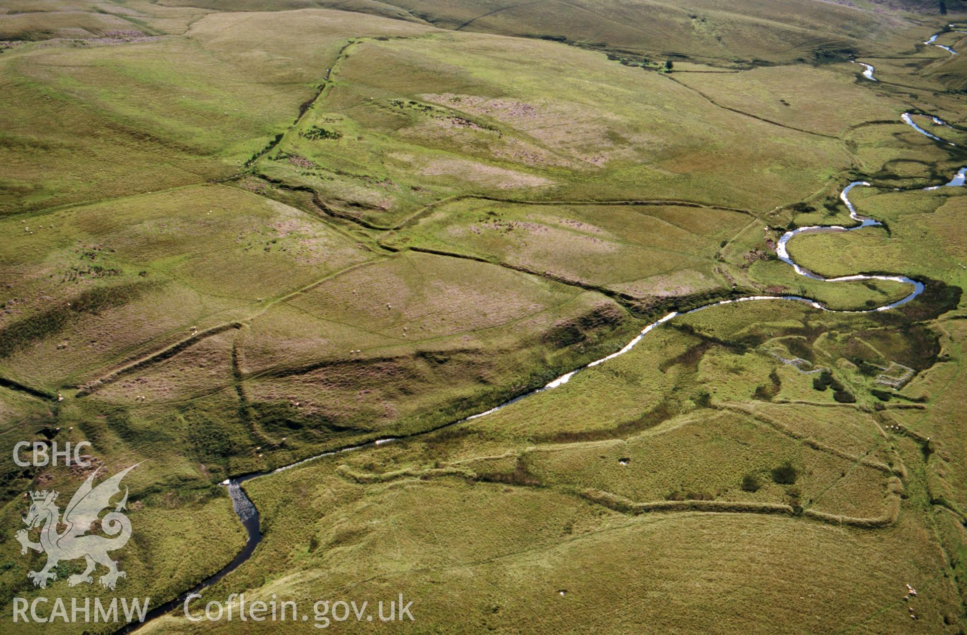 RCAHMW colour slide oblique aerial photograph of Byllfa-uchaf East, Merthyr Cynog, taken on 27/08/1998 by Toby Driver