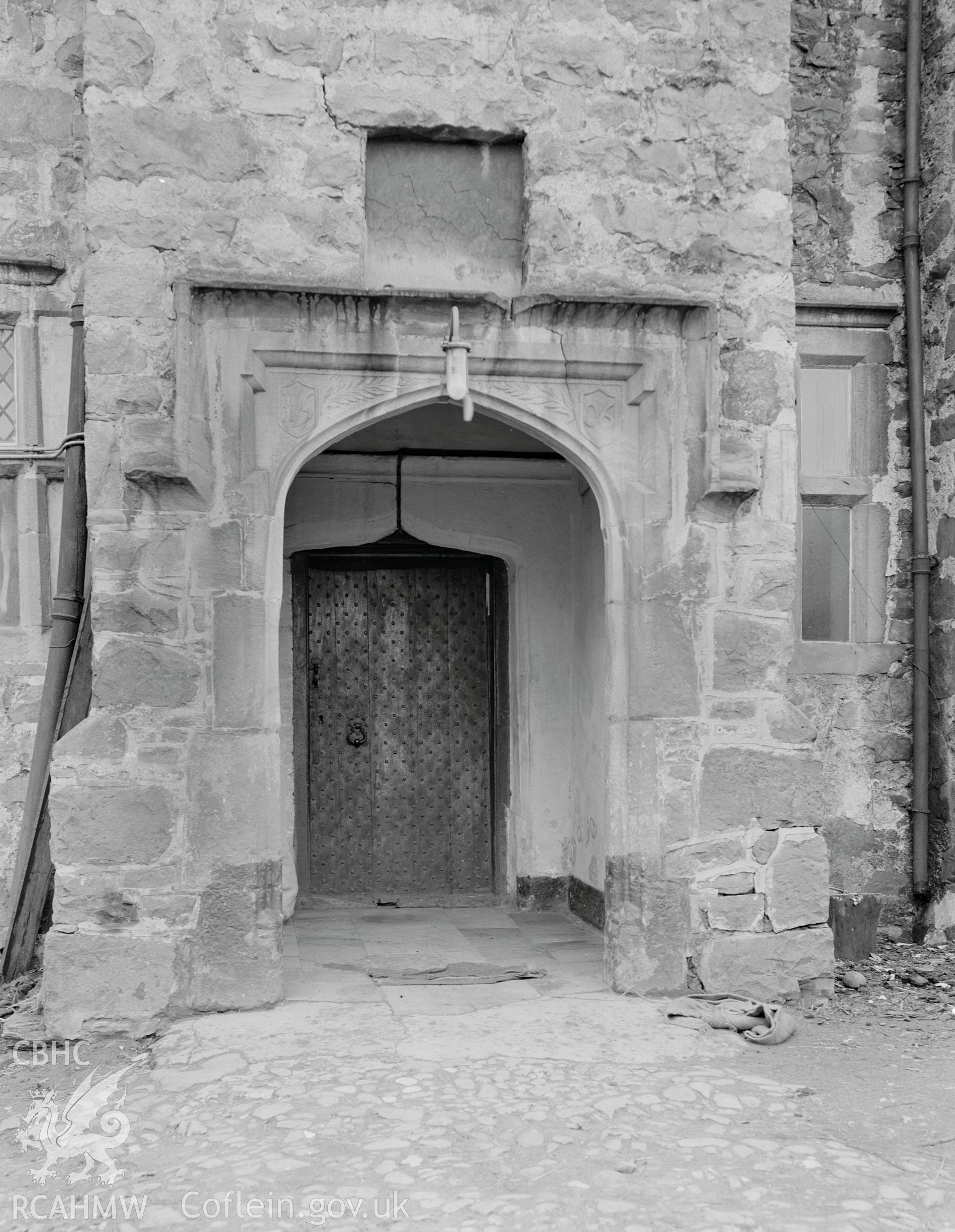 Exterior view of Fferm, showing doorway to the north porch, taken 11.04.1942.