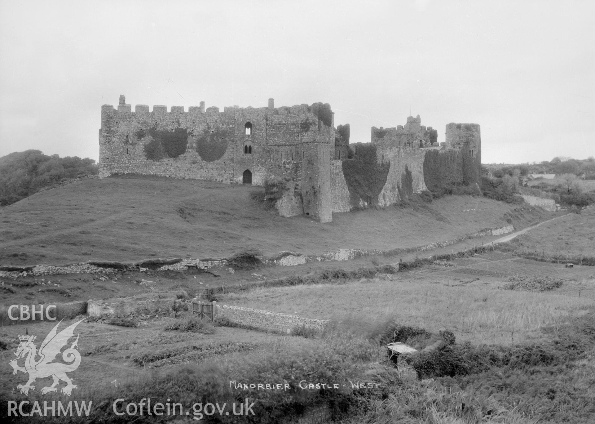 Landscape view of Manorbier Castle from the west taken by W.A. Call 1931.