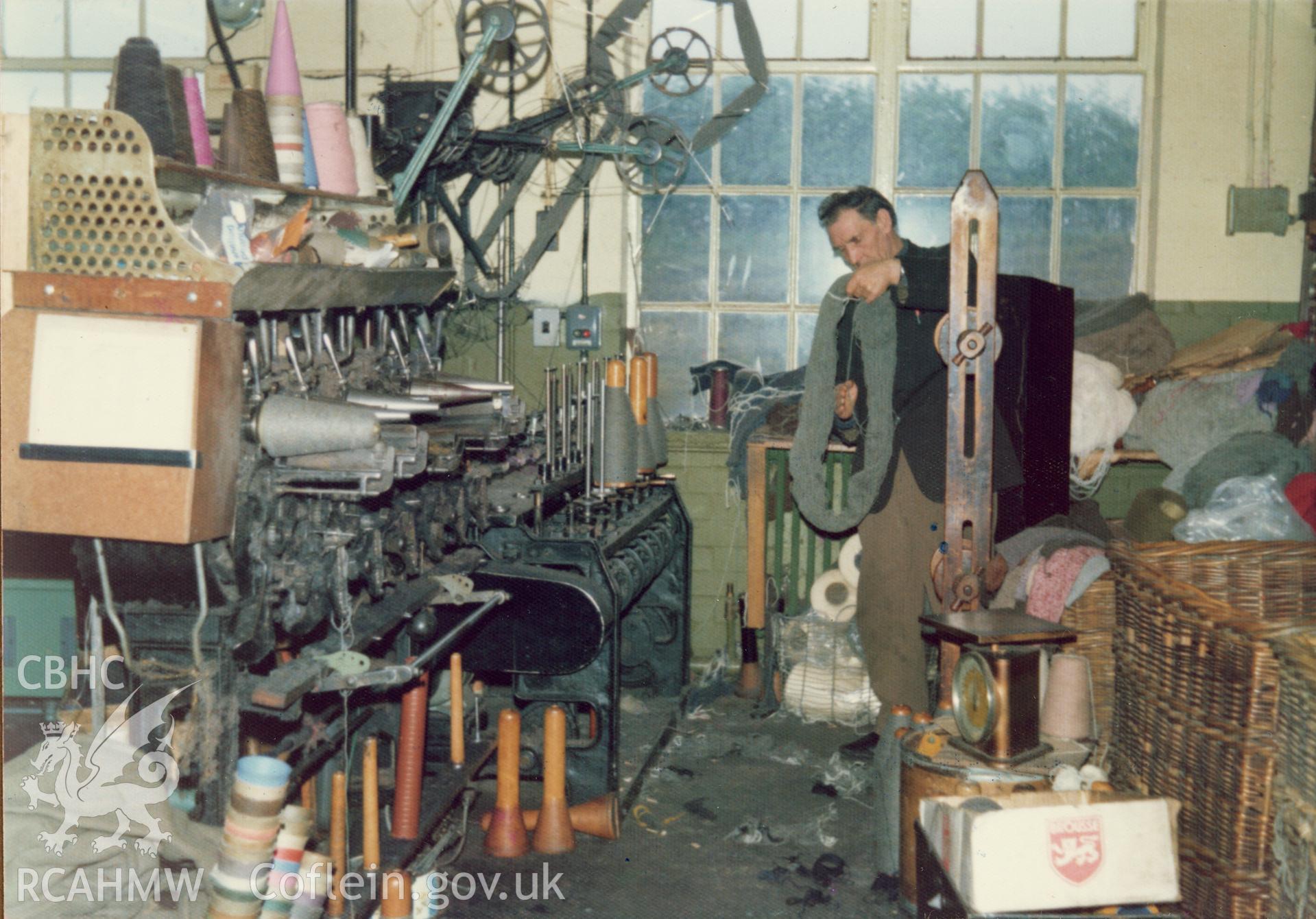 Interior view showing the cone winding machine at Cambrian Wool Factory.