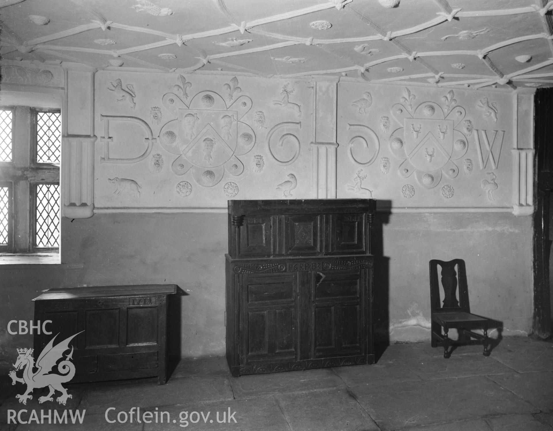 Interior view of Plas Mawr, showing decorated plaster wall and ceiling, taken 06.08.1950.
