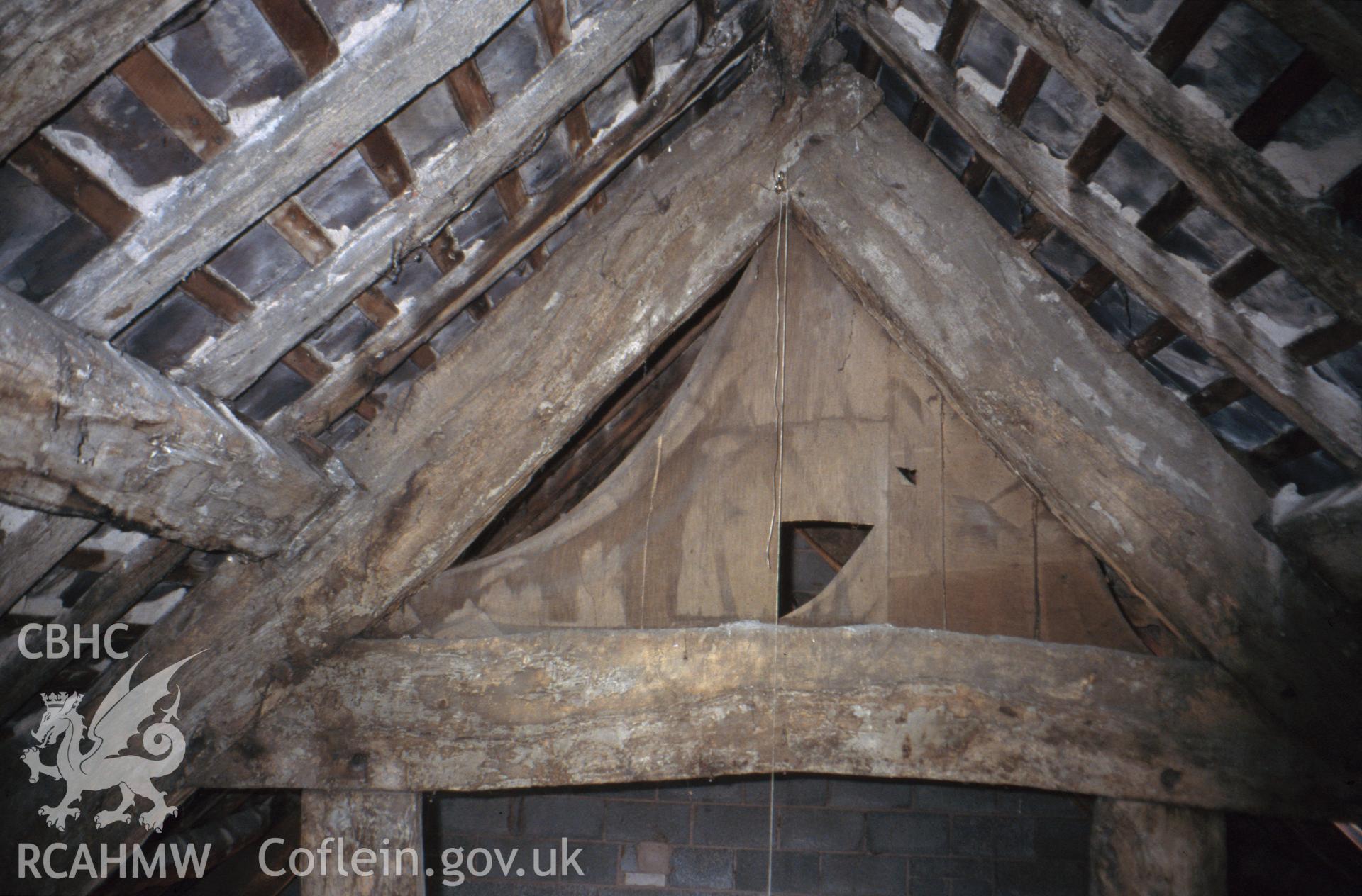 Interior view showing roof  truss at kitchen end.