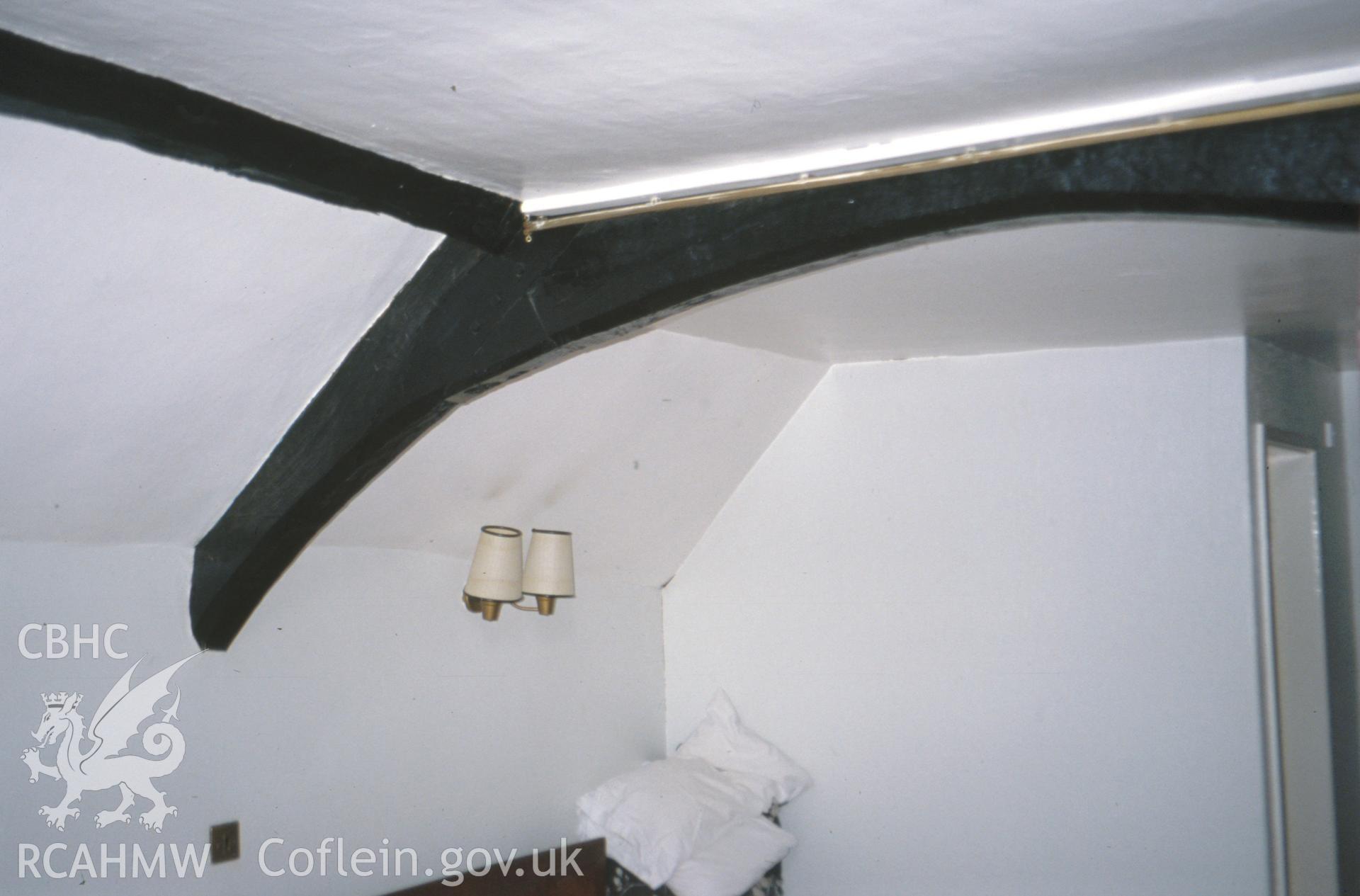 Interior view showing arched collar truss to the room above the porch.