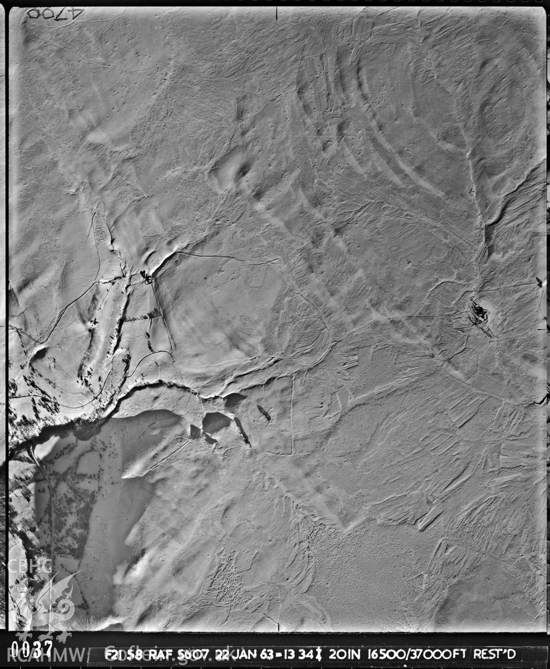 Black and white vertical aerial photograph taken by the RAF in 1963, centred on the area around Llanidloes..