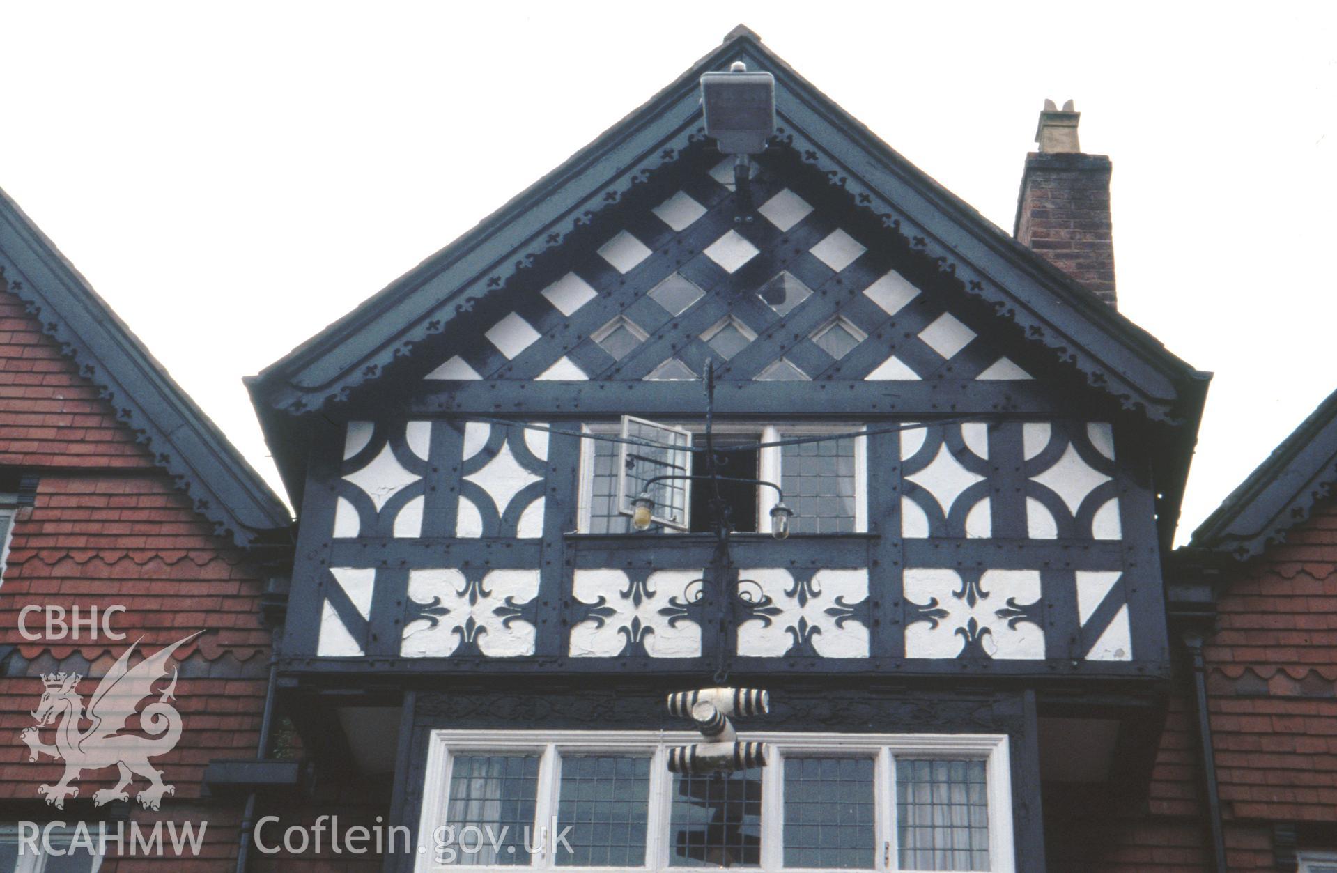 Exterior view showing detail of decorative framing on the porch.