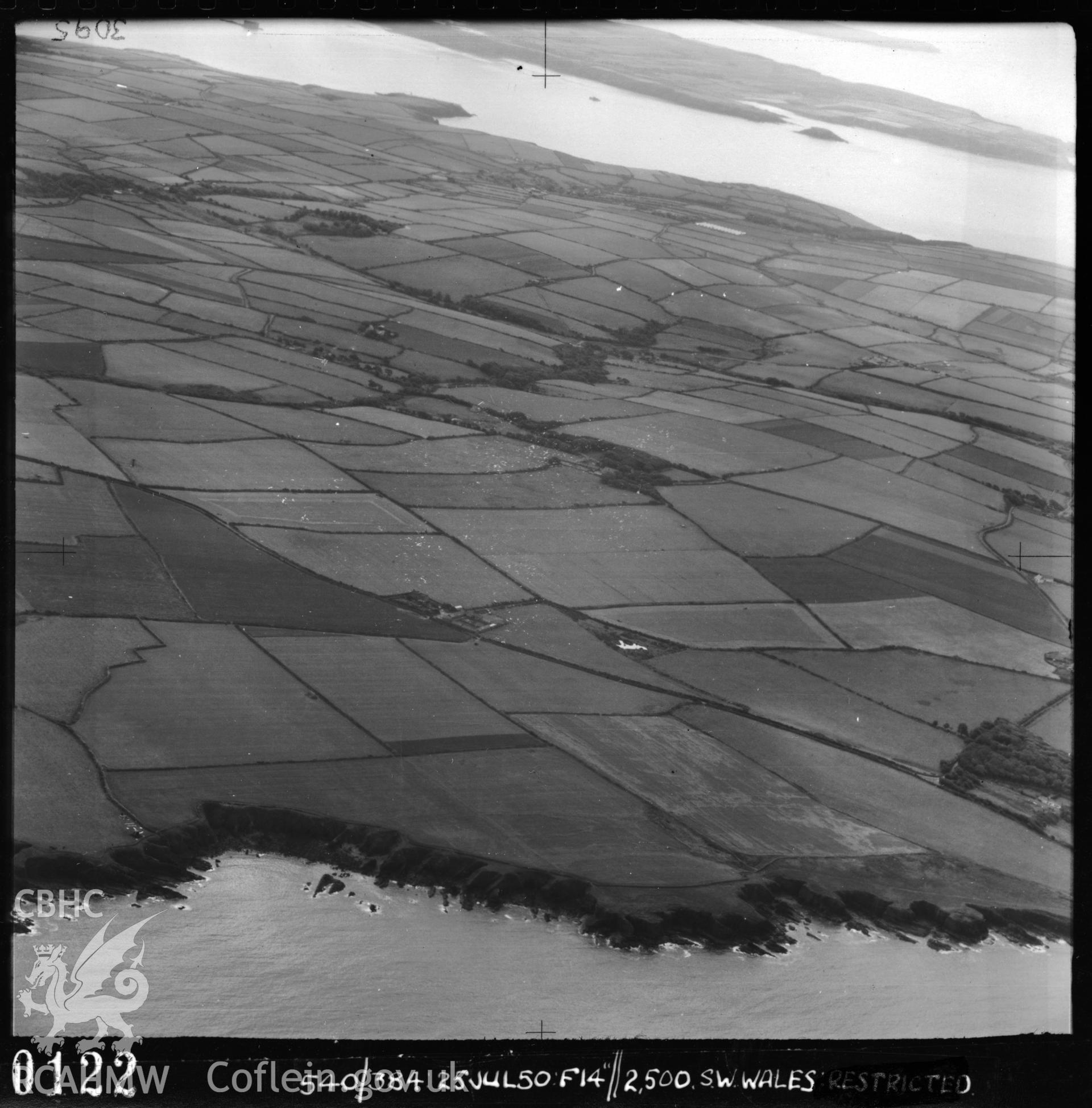 Aerial oblique of the coastland between St Davids Head and Skomer Island. Taken 25.07.1950. Box C32, UK3627.