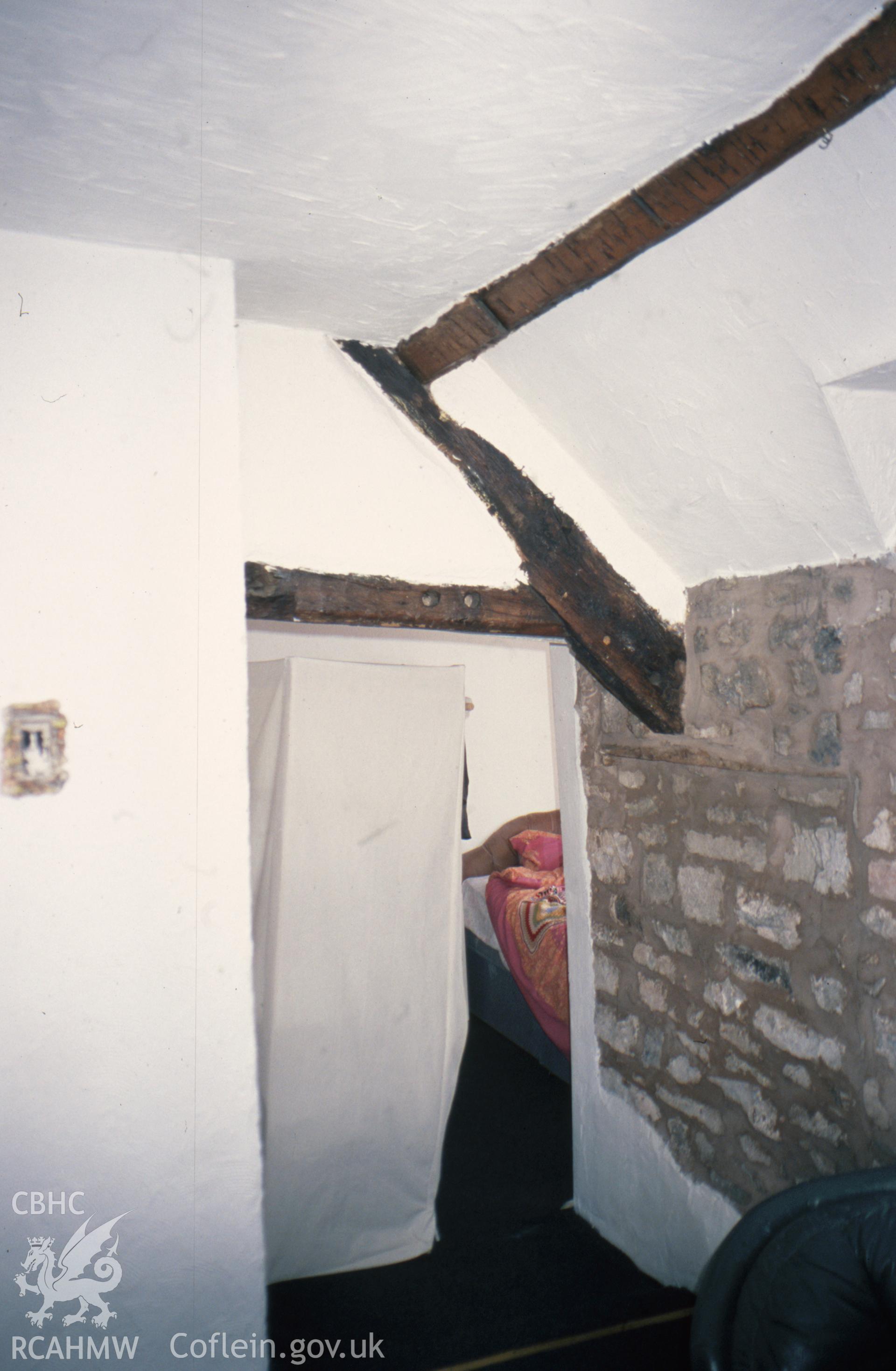 Interior view showing truss over hall fireplace.