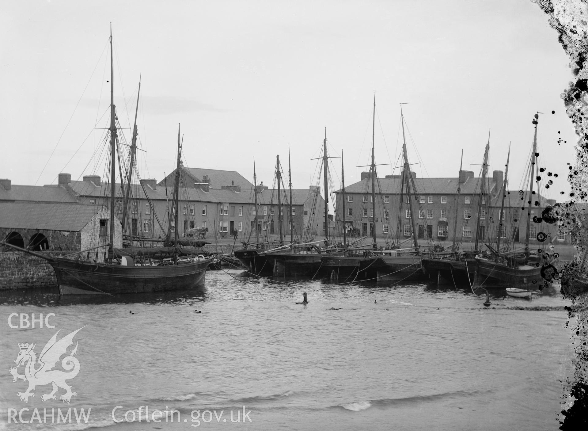 Black and white image dating from c.1910 showing the inner harbour in Aberaeron.