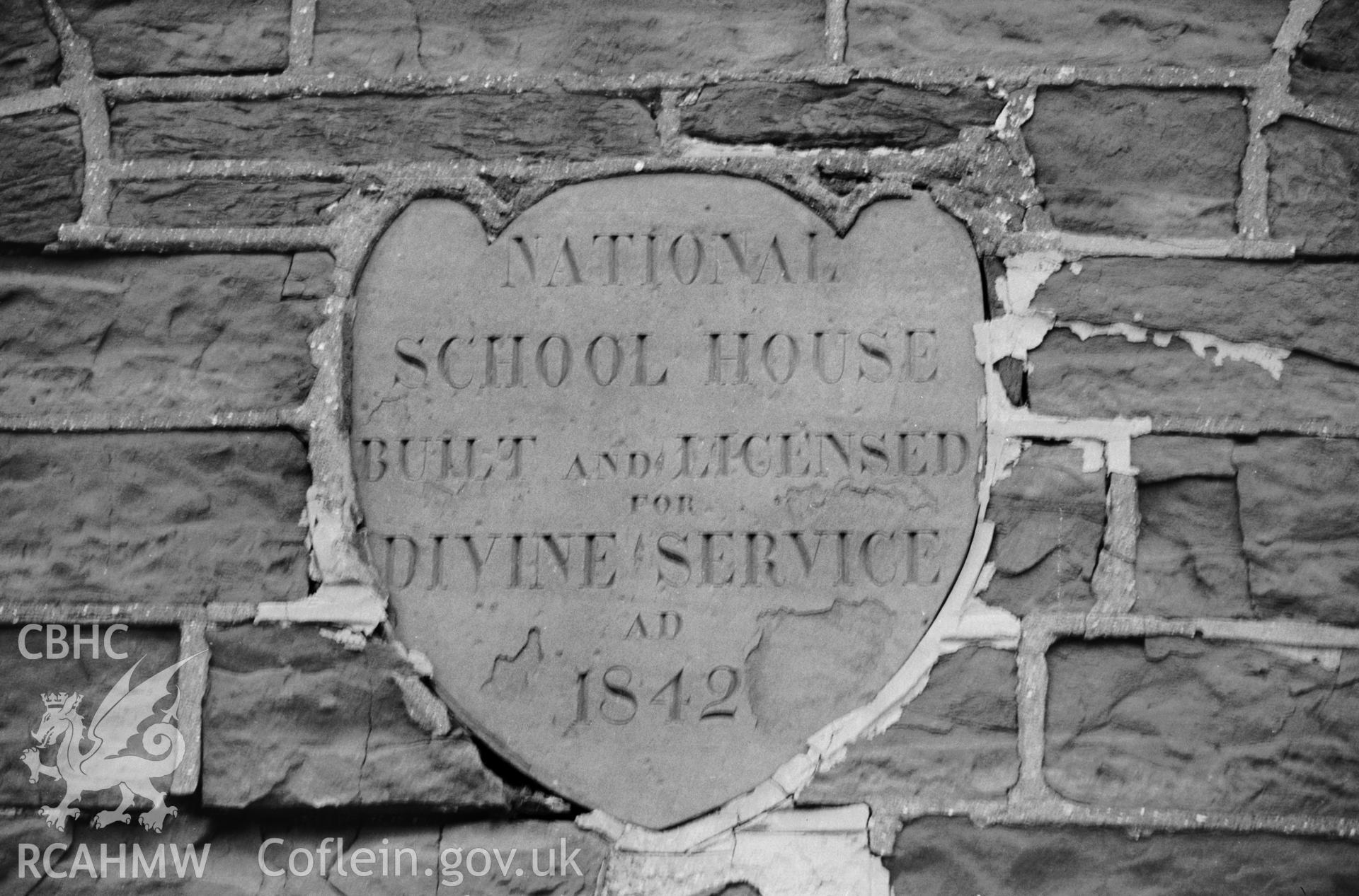 Black and white photograph showing the plaque on the former National School, Borth, produced by Malcolm Seaborne, September 1989.
