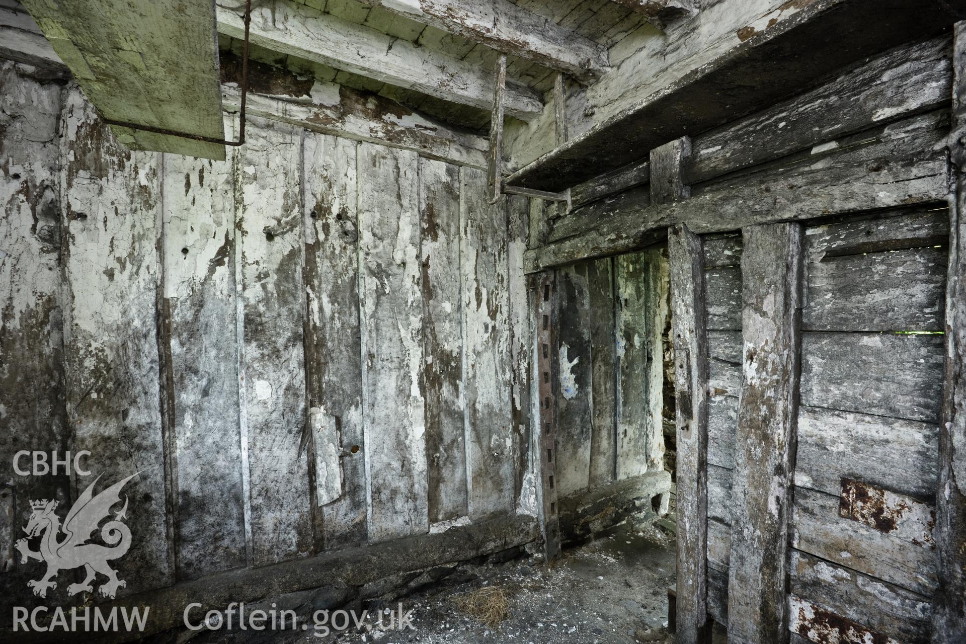 Interior, pantry/dairy, showing changed doorway and mortice joints for ventilation/security rails.
