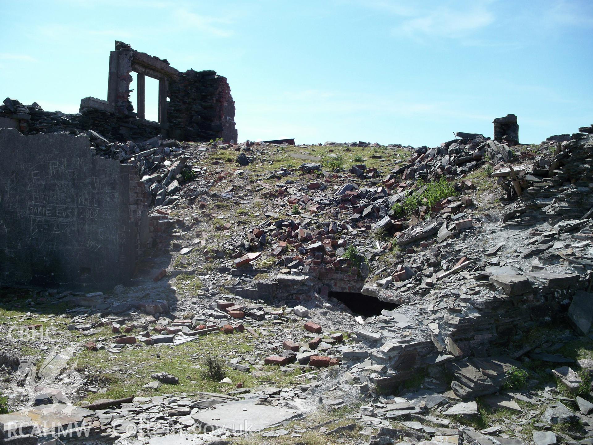 The remains of Gwylfa Hiraethog in 2009.  The interior, with part of cellar arch exposed, taken from the north.