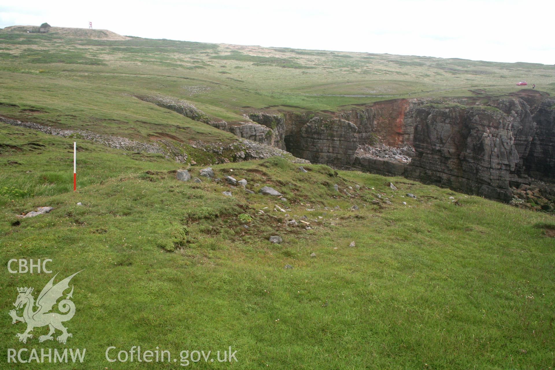 Looking north-east across inner face of the enclosure bank.