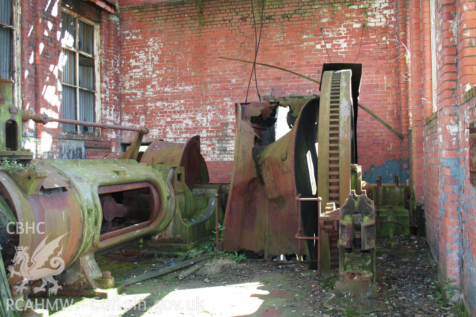 1910 Engine House interior looking east, showing the Musgrove Engine, main drive to the exterior flywheel and large internal flywheel.