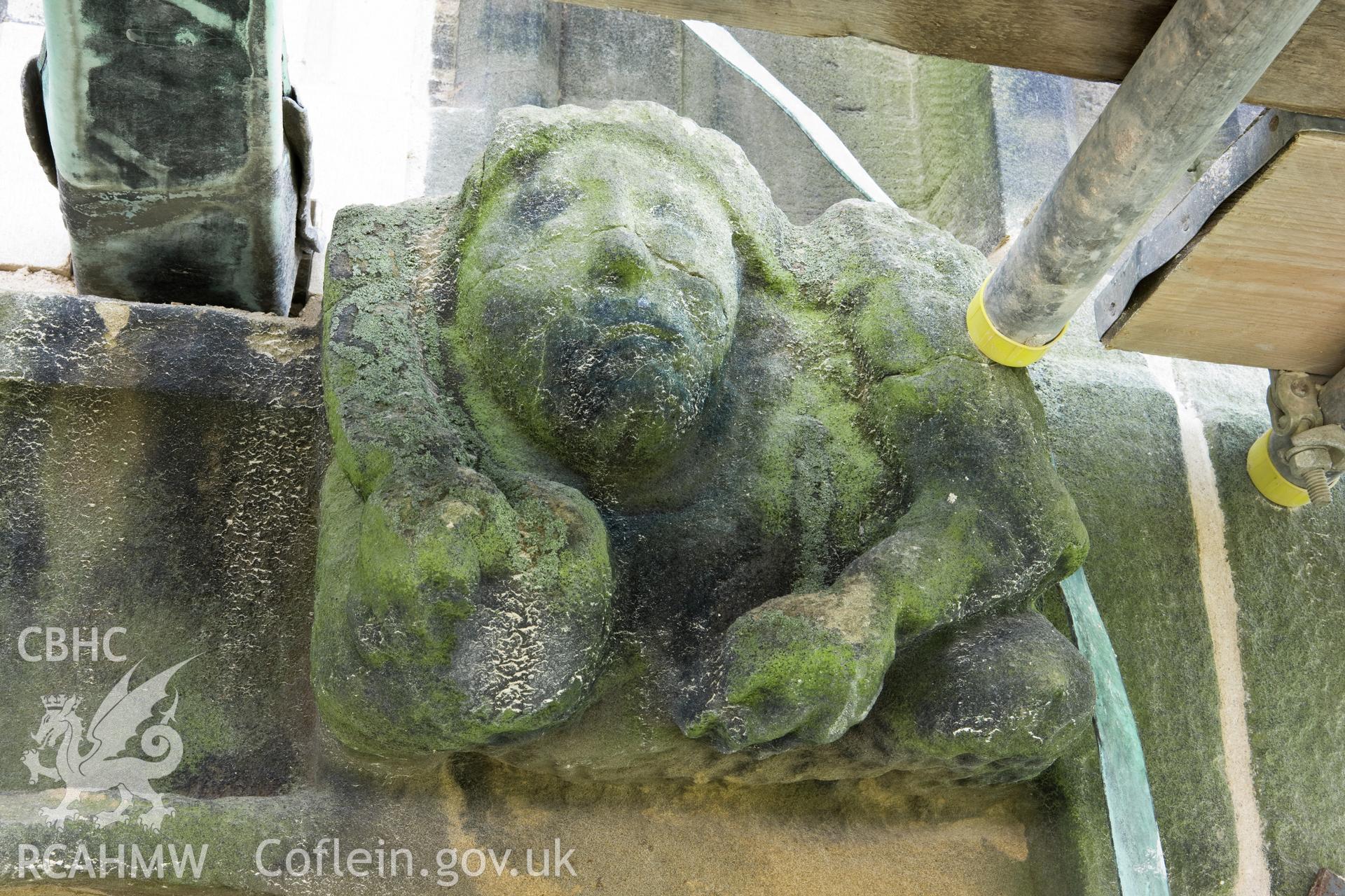 Stone carving below finials, moving clockwise.